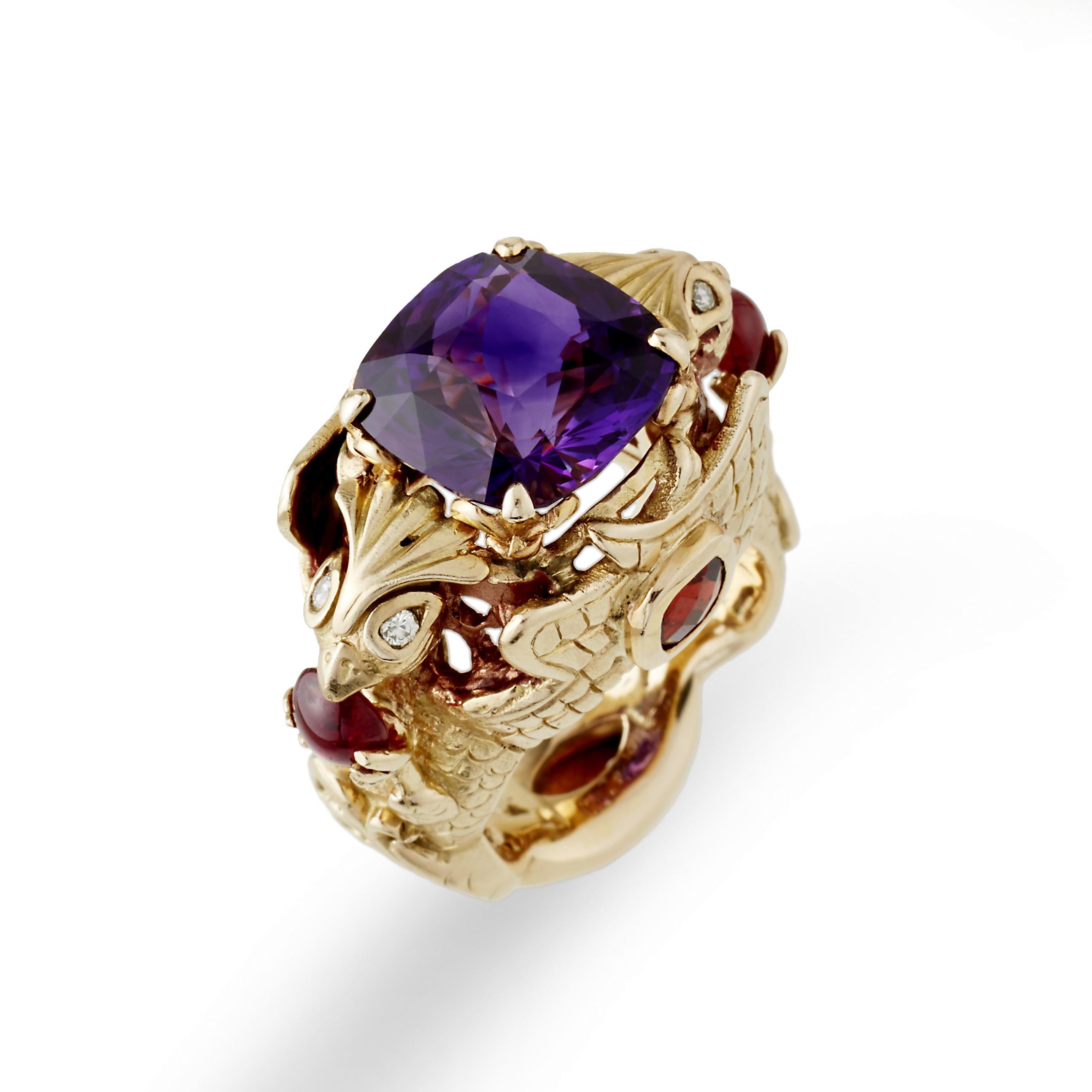 A spirit of love rising your heart, joy surrounds you and this spectacular Russian Purple Cushion Amethyst, Set with garnets and rubies. 18kt yellow gold - live each day with passion!!!

A wonderful conversation piece!