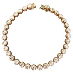 Bracelet en or rose 8 carats avec lunette de diamants