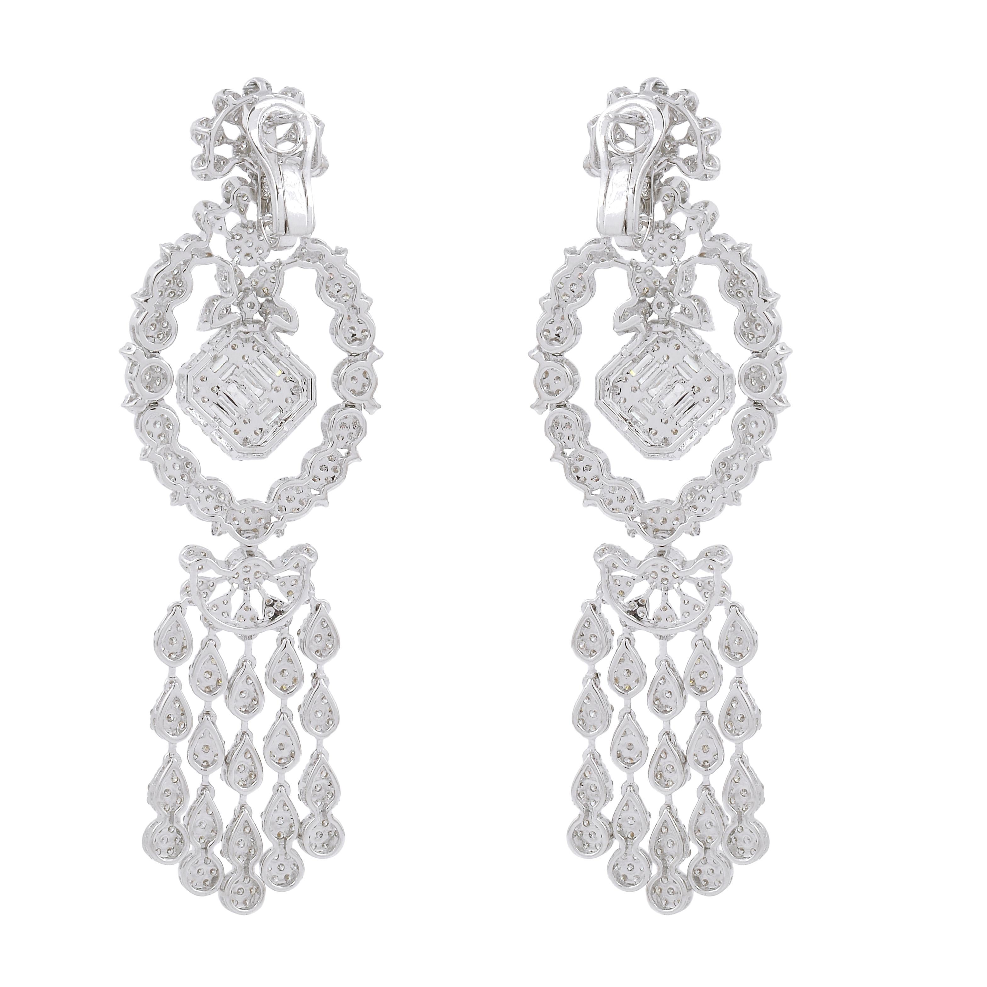 Each earring features a cluster of sparkling diamonds set in 18k solid gold, creating a brilliant and glamorous effect. The diamonds are carefully selected, ensuring that these earrings will shine brightly in any light. These earrings are available