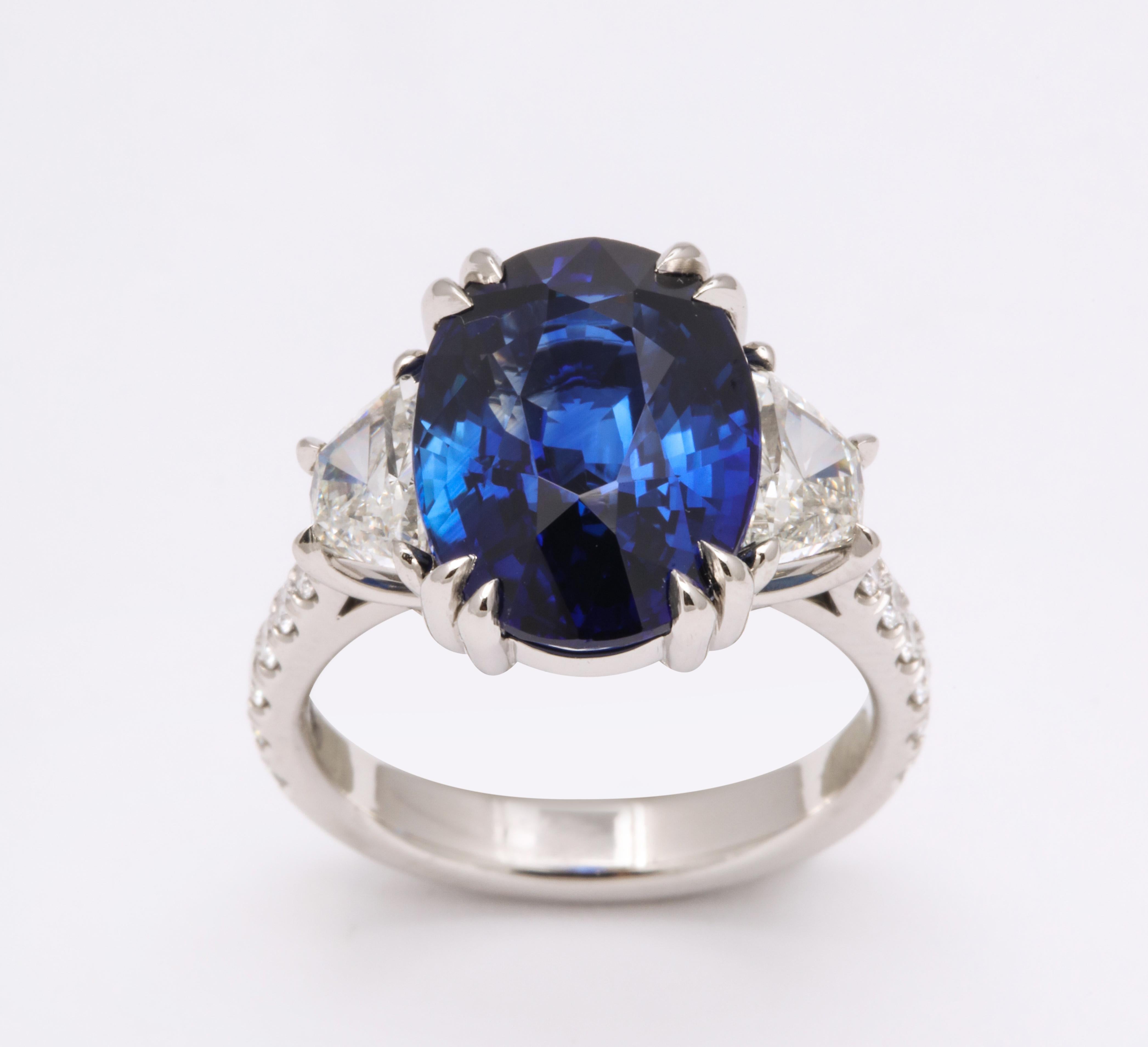 
8.62 carat Vivid Blue Ceylon Sapphire!!

A fabulous and vibrant blue sapphire set in a fabulous custom diamond ring. 

The ring features 1.45 carats of white side and round brilliant cut diamonds set in platinum. 

The sapphire is certified by