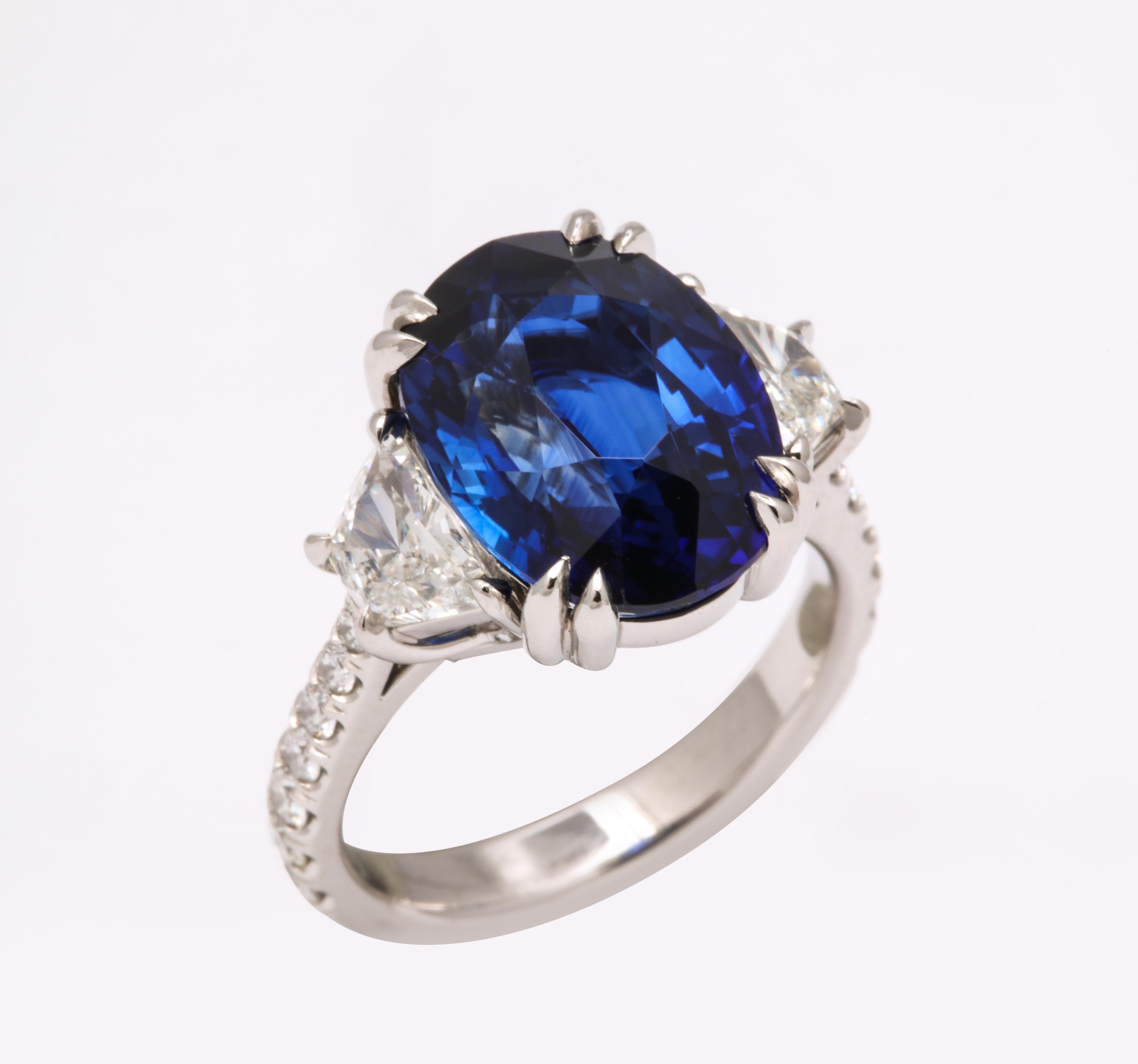Oval Cut 8 Carat Vivid Blue Sapphire and Diamond Ring
