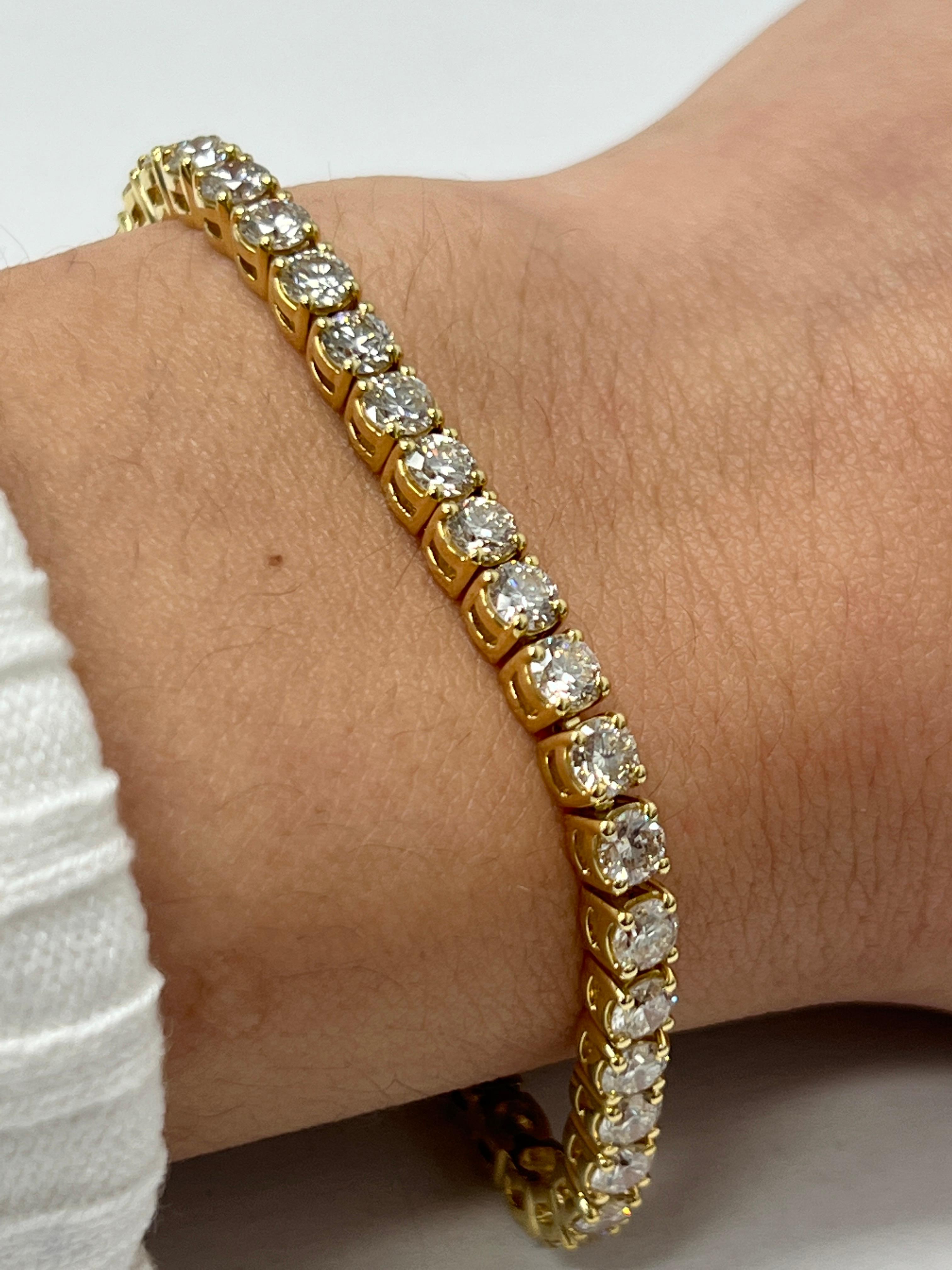 Fashion and glam are at the forefront with this exquisite diamond bracelet. This 18-karat yellow gold diamond bracelet is made from 15 grams of gold. The top is adorned with one row of I-J color, VS/SI clarity diamonds. This bracelet carries 45