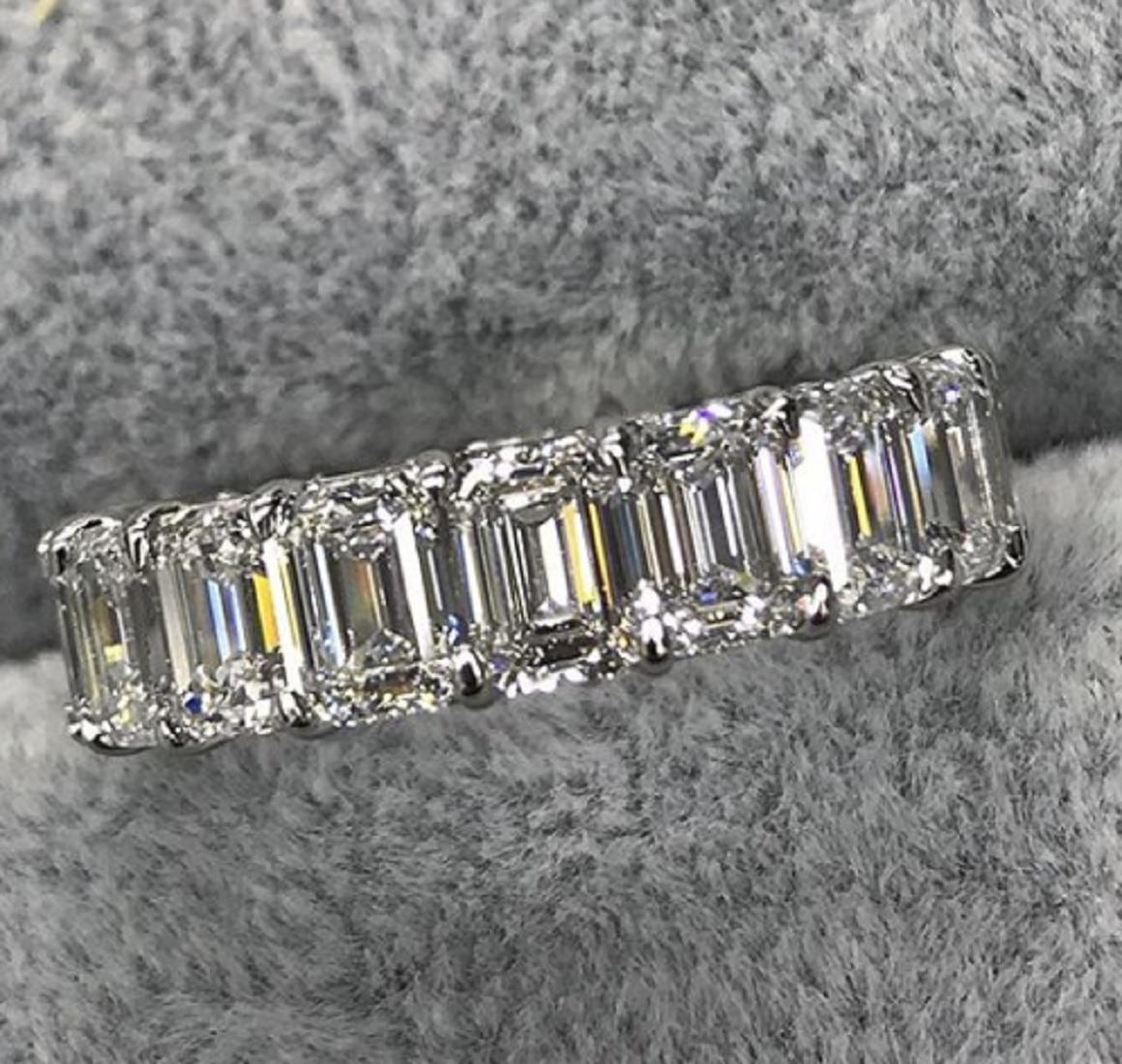 8 carats emerald cut diamond eternity band ring
VS CLARITY
F COLOR 
EXCELLENT CUT DIAMONDS
18 CARATS WHITE GOLD SETTING
REQUIREMENT OF TIME 14 DAYS TO BE READY TO SHIP