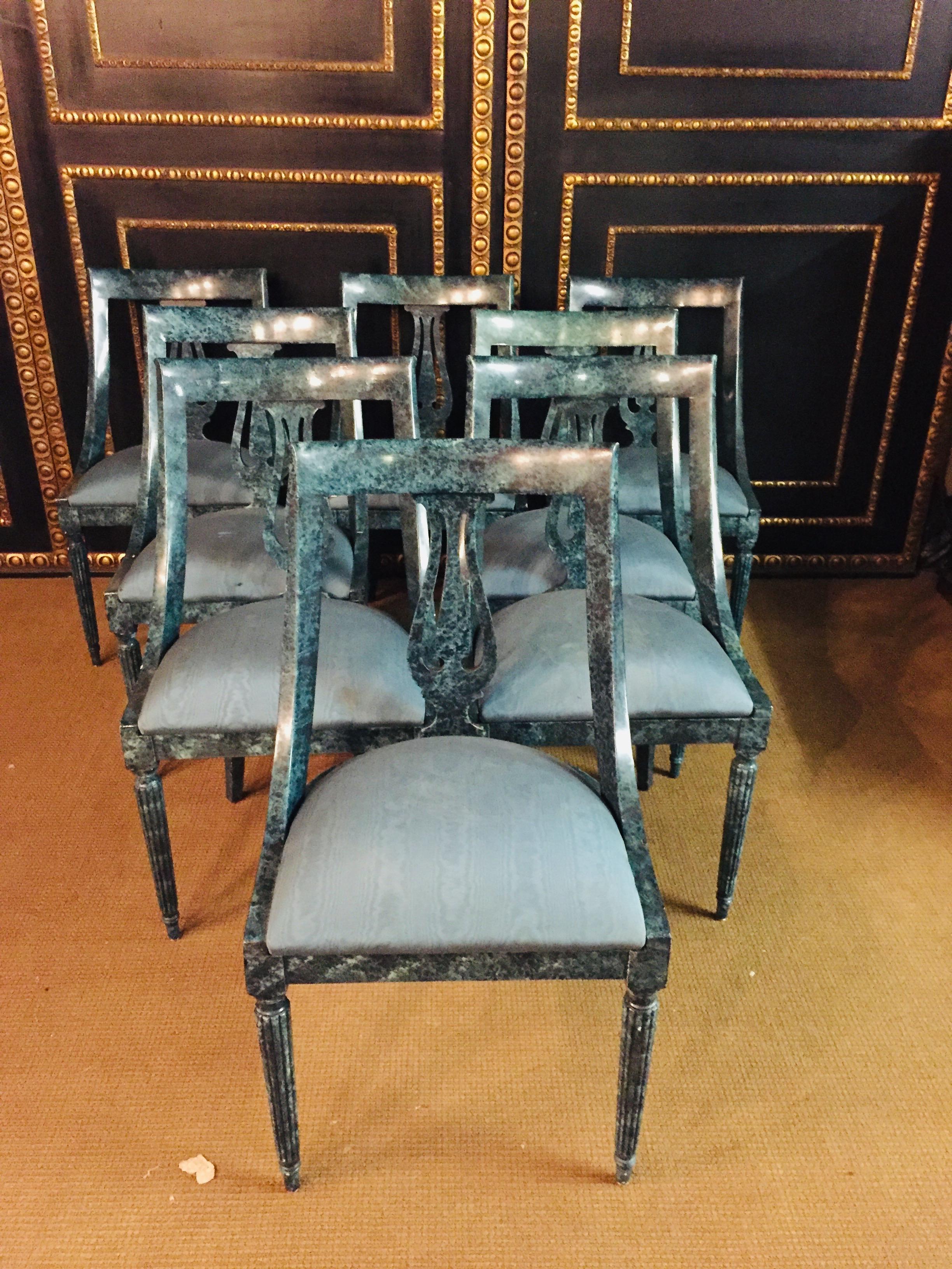 8 chairs in the modern Empire style turquoise marbled.