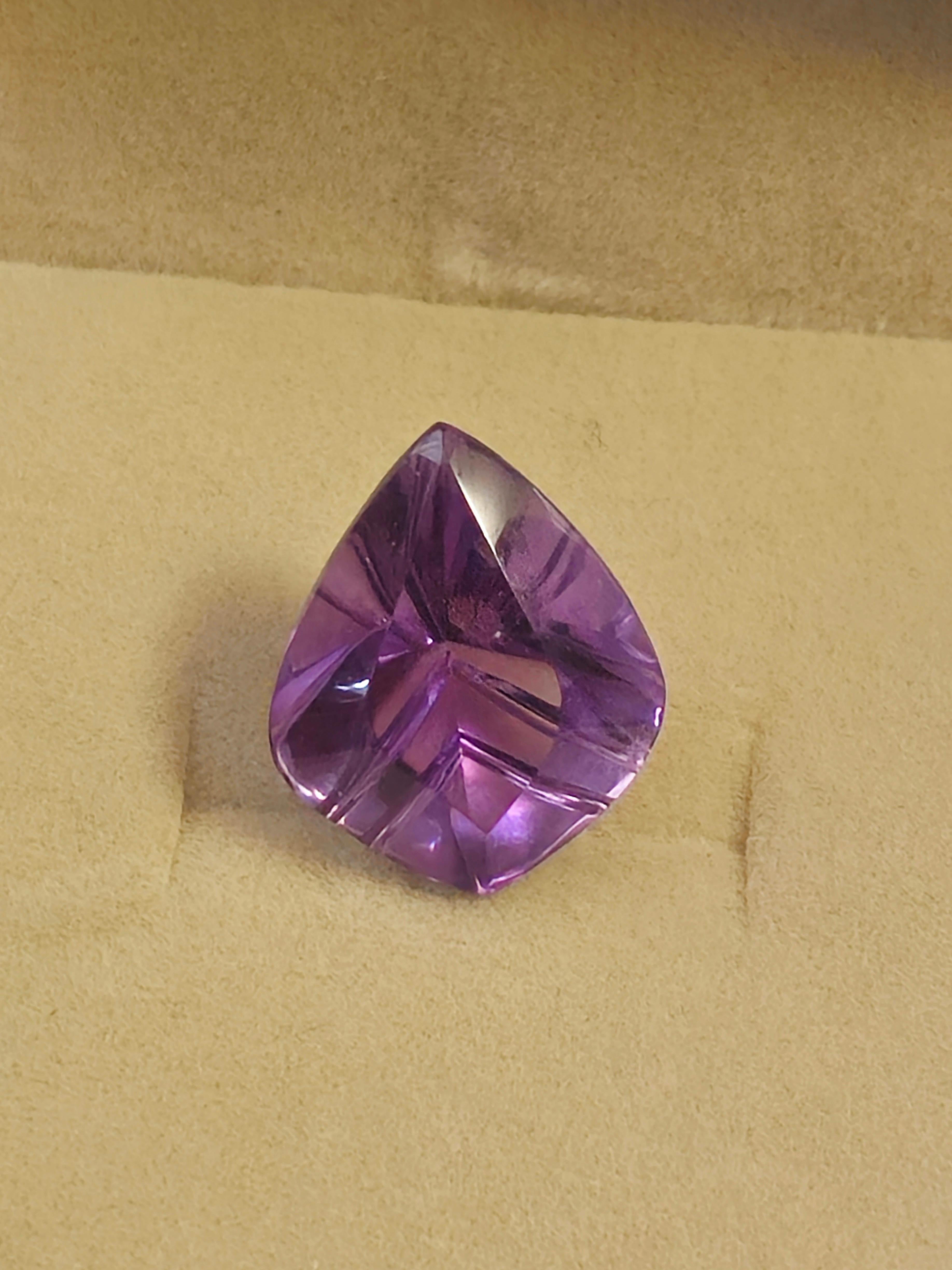 This stunning 8 ct. Amethyst Kite Fantasy Cut gemstone is a must-have for any jewelry enthusiast. With its unique shape and intricate design, this gemstone is perfect for creating a one-of-a-kind piece that is sure to catch the eye. The rich purple