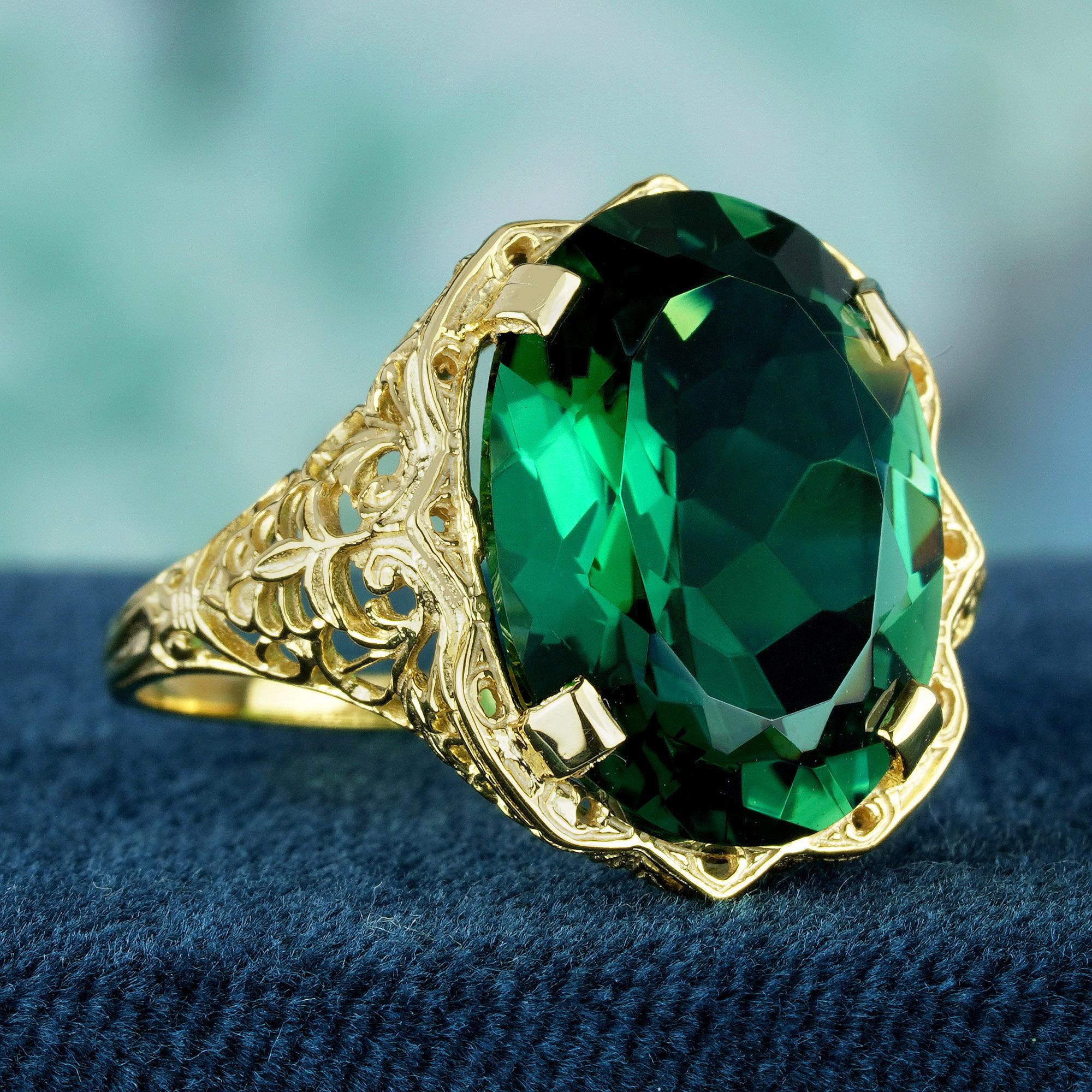 Embrace the allure of vintage glamour with our oval green quartz vintage style ring set in prongs on a delicate yellow gold band with filigree. Exquisitely crafted, its intricate filigree detailing adds a touch of old-world charm to any ensemble.