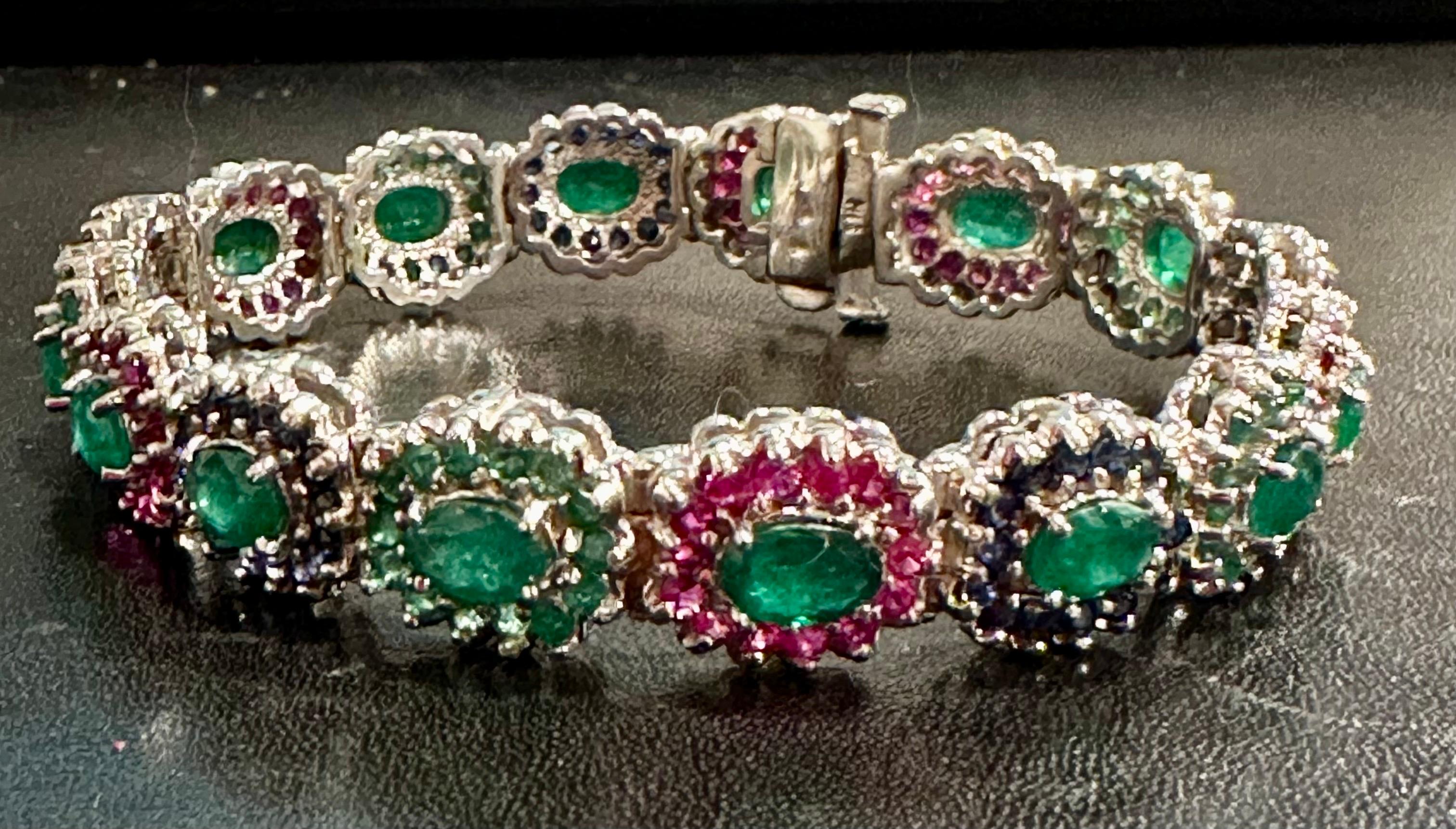 Approximately 8 Ct Oval Cut Emerald & Ruby & Sapphire Tennis Bracelet 14 Kt White Gold 25.6 Gm, 7.5 inch long
Other people are selling similar bracelet for double or triple the prices. I get shock by seeing those prices.
Please read my bracelet