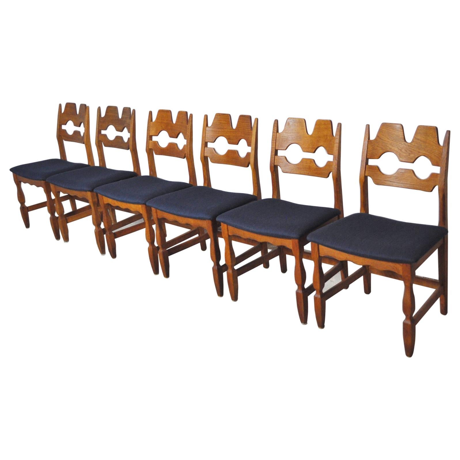 8 Danish Dining Chairs by Henning Kjærnulf For Sale