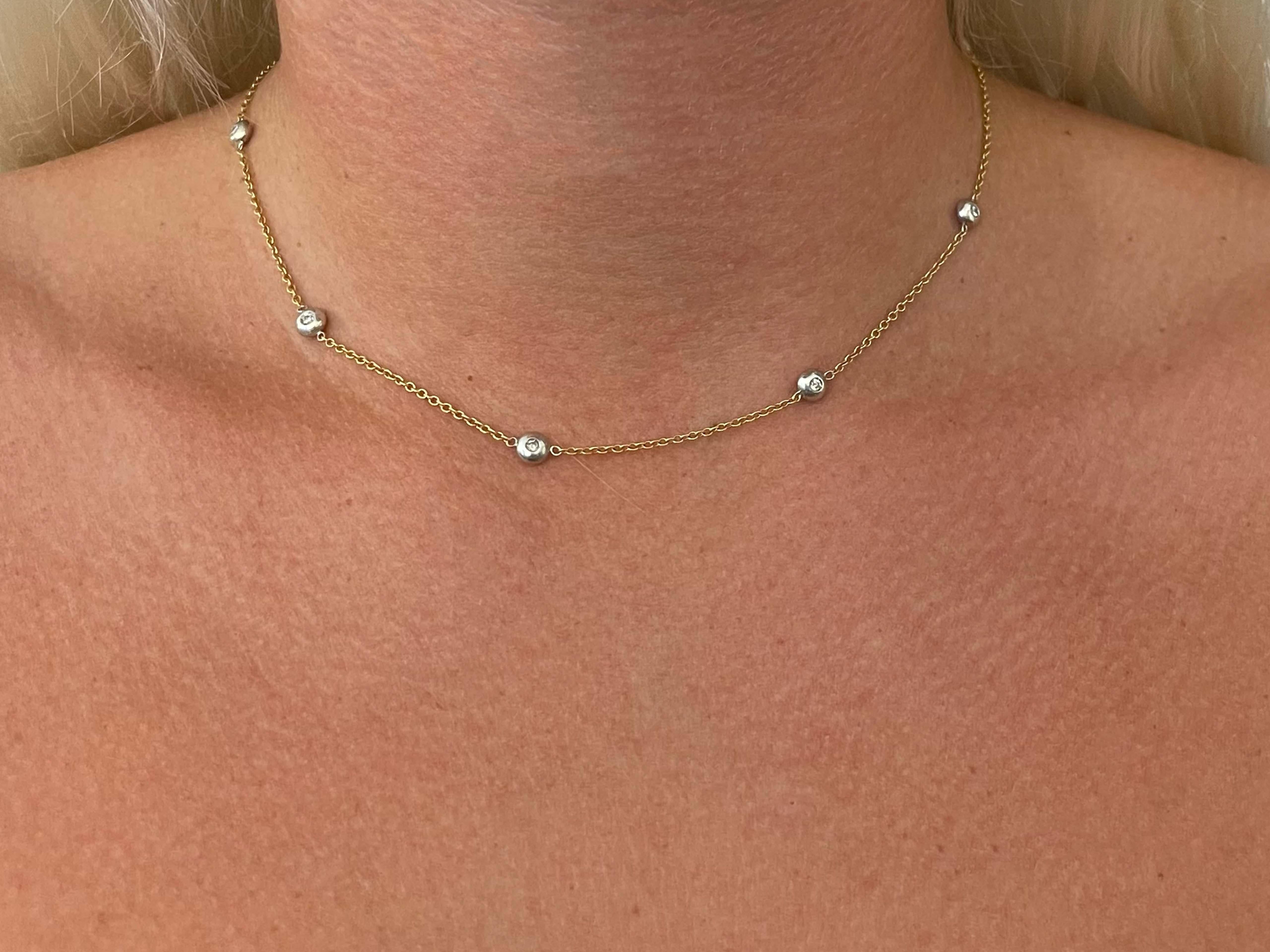 Spécifications de l'article :

Métal du collier : or jaune et blanc 18k

Poids total : 6,4 grammes

Longueur de la chaîne : 16 pouces

Nombre de diamants : 8 taille brillant

Clarté du diamant : G

Couleur du diamant : VS

Poids en carats du diamant