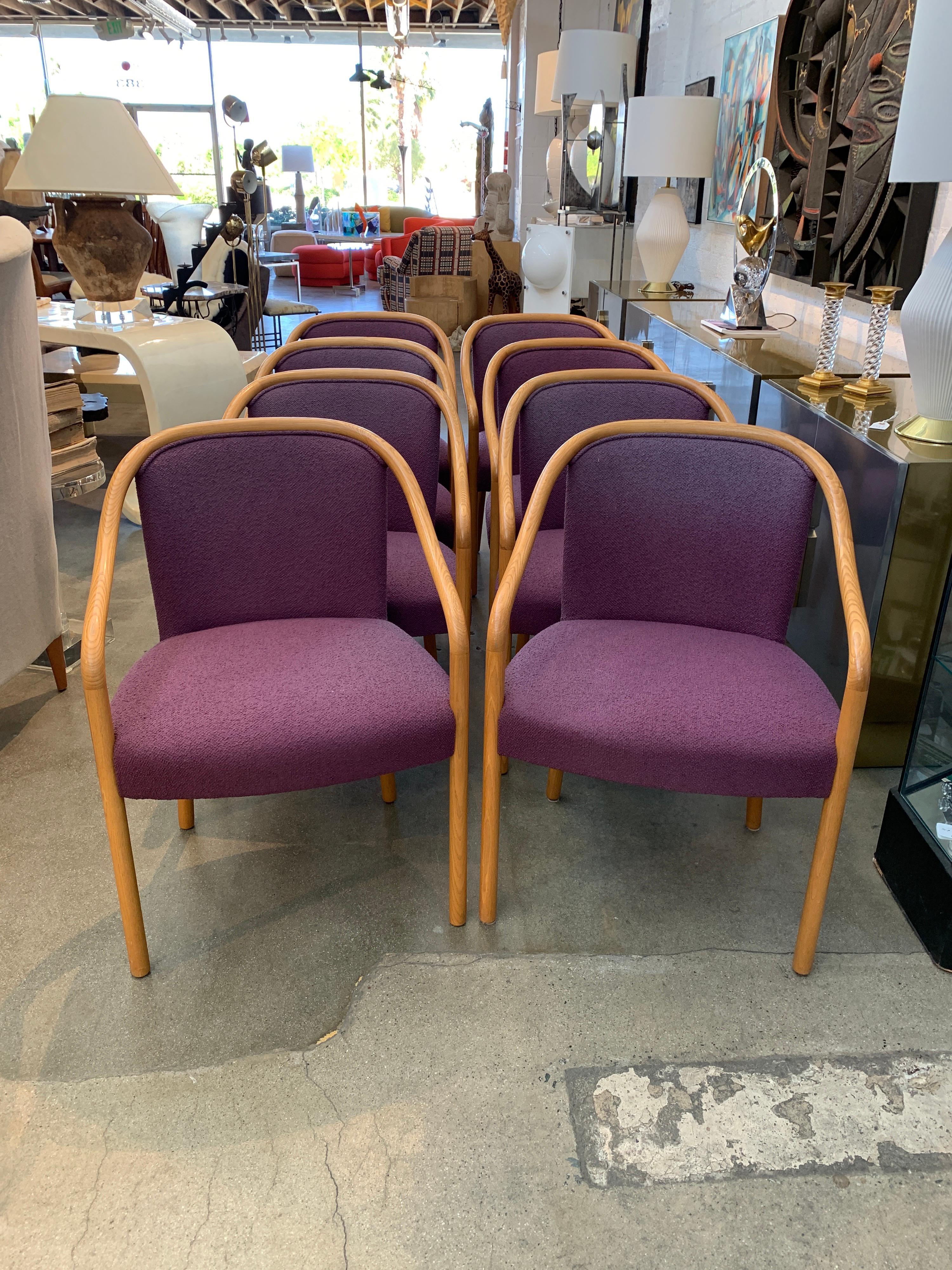 A set of 8 dining chairs by Arhtur Elrod made by Brickel Associates for a custom Palm Springs home. Accompanied by a dining table listed separately. These chairs feature the original upholstery in a Plum Chenille and are triple tagged, pictured. The