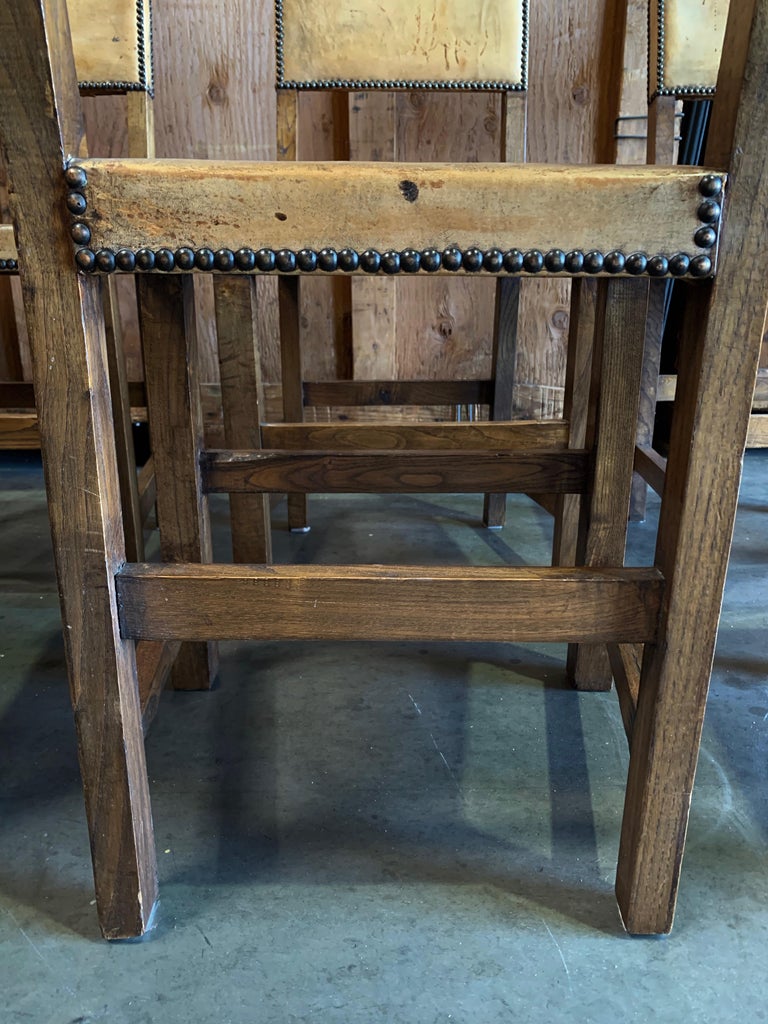 8 Distressed Leather Chairs with Studs For Sale at 1stDibs