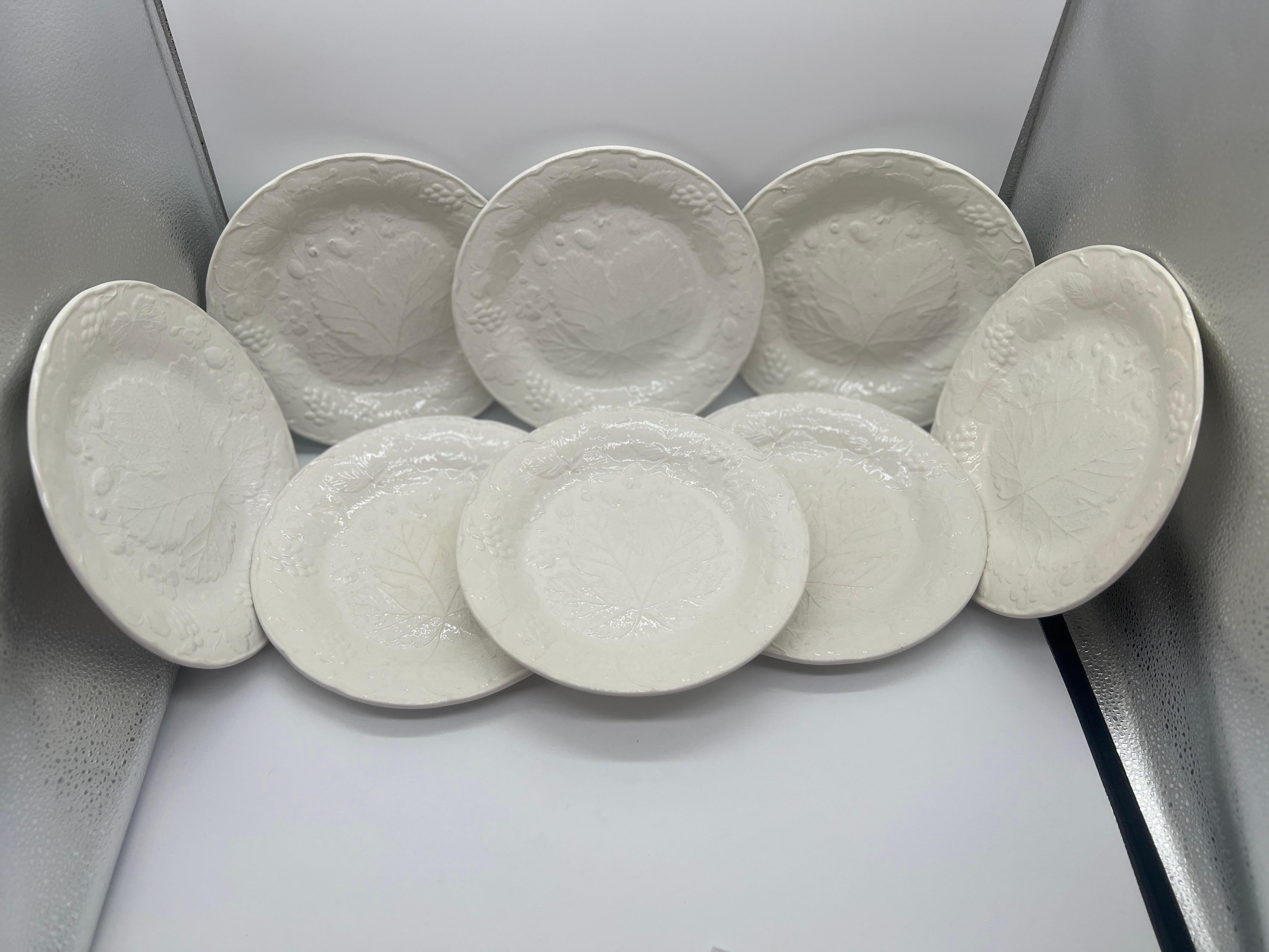 Burleigh BURGESS & LEIGH (English, founded 1851), active 1988-2005. 

A set of (8) eight dinner plates in the Strawberry and Grape Leaf pattern. Each marked to underside. 