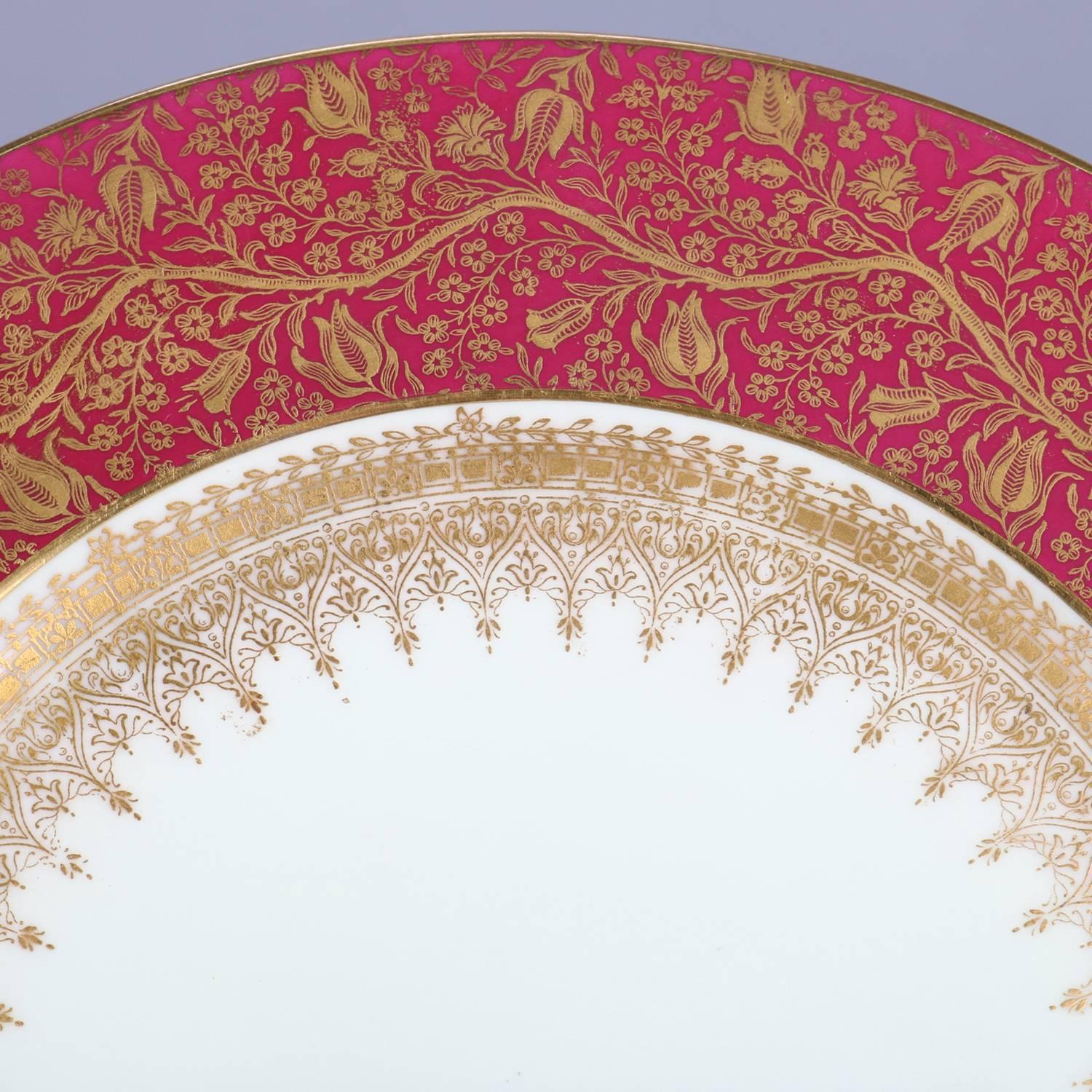 Porcelaine Huit assiettes plates anglaises en porcelaine fine dorée par George Jones Crescent & Sons