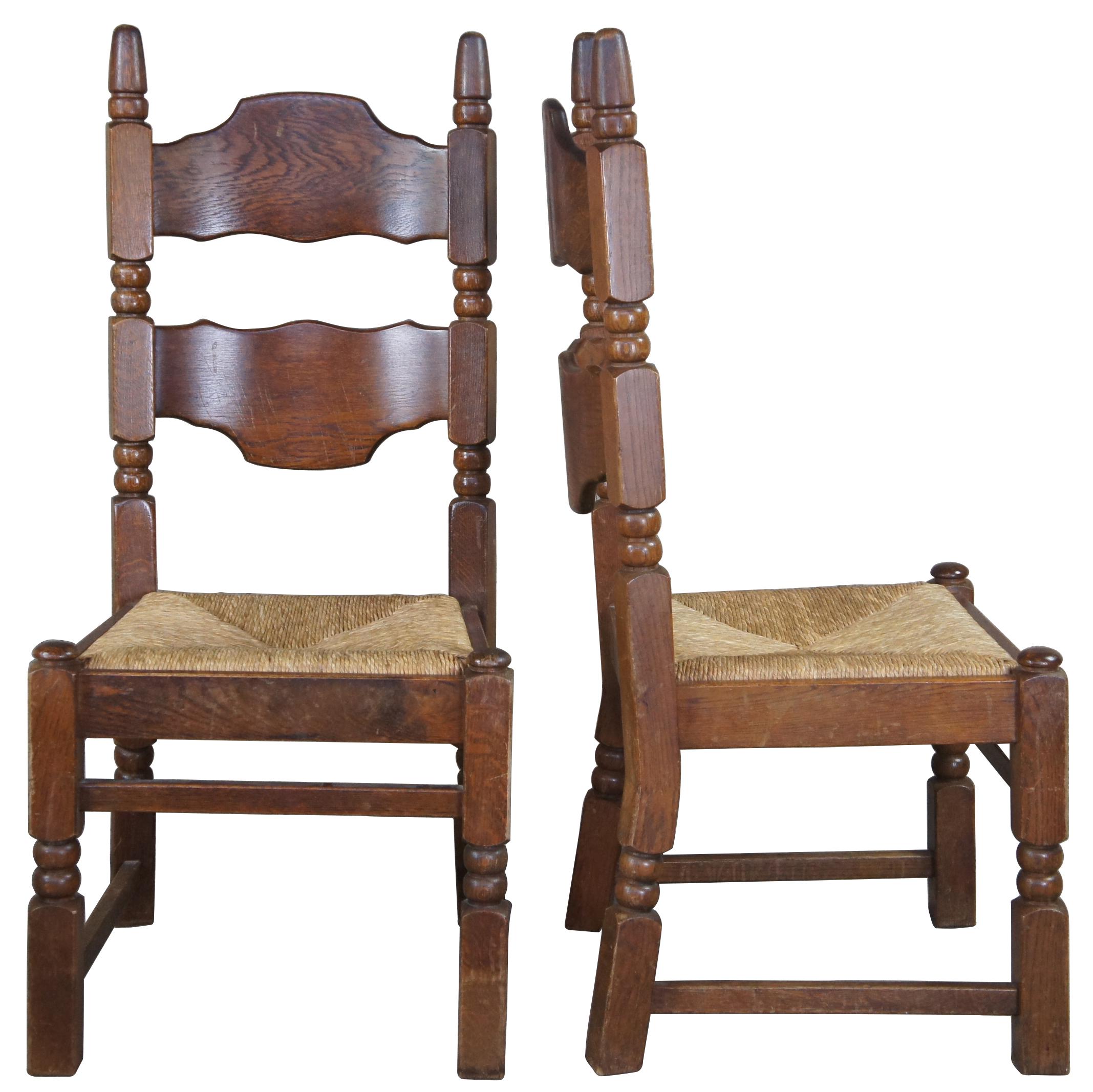 Set of eight old world dining chairs. Made from a heavy oak frame with curved ladder back, gothic style posts and rush seat.
 
