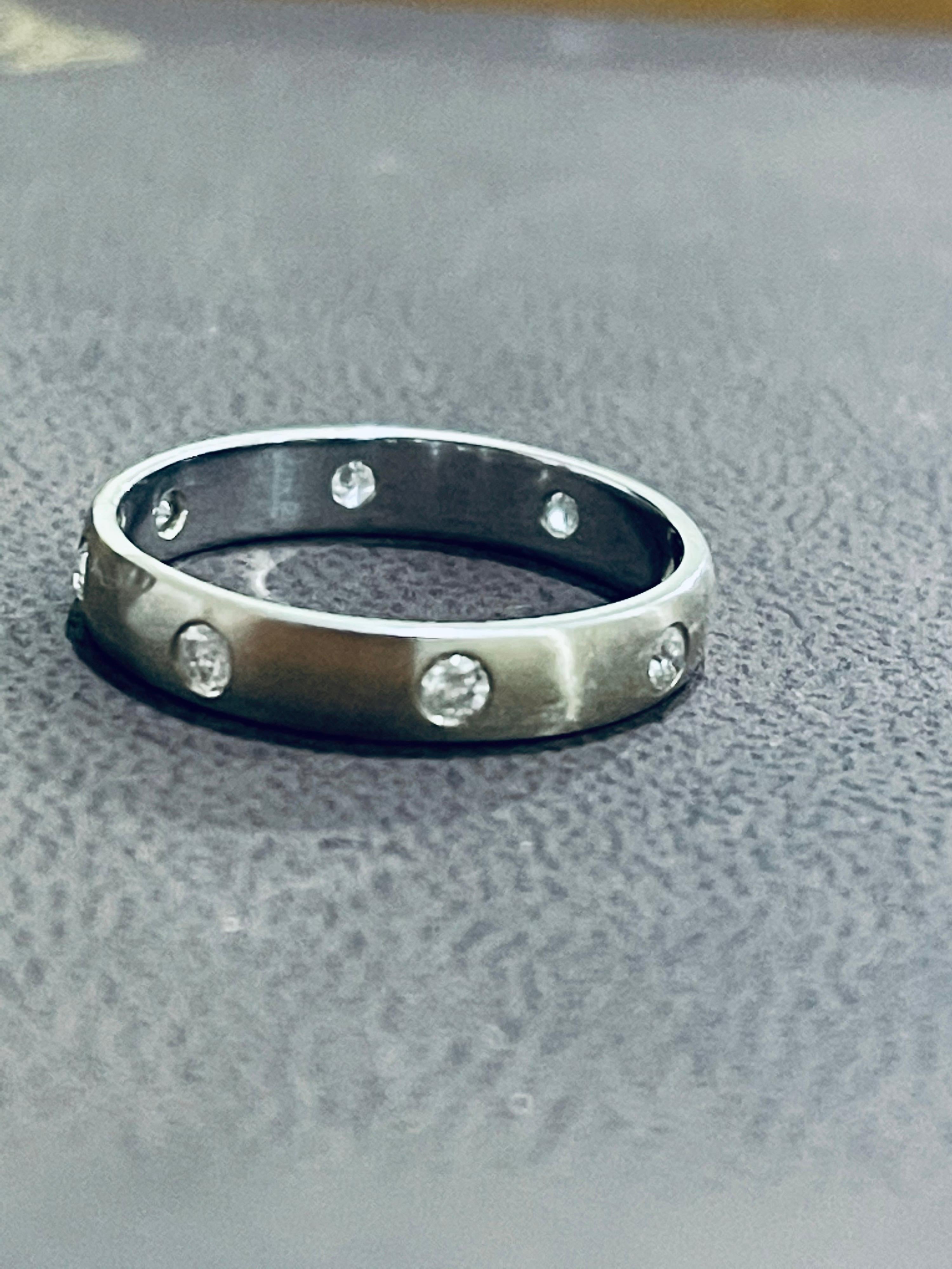 8 Flush Set Bezel Diamond Eternity Wedding Band in 14 Karat White Gold In Excellent Condition For Sale In New York, NY