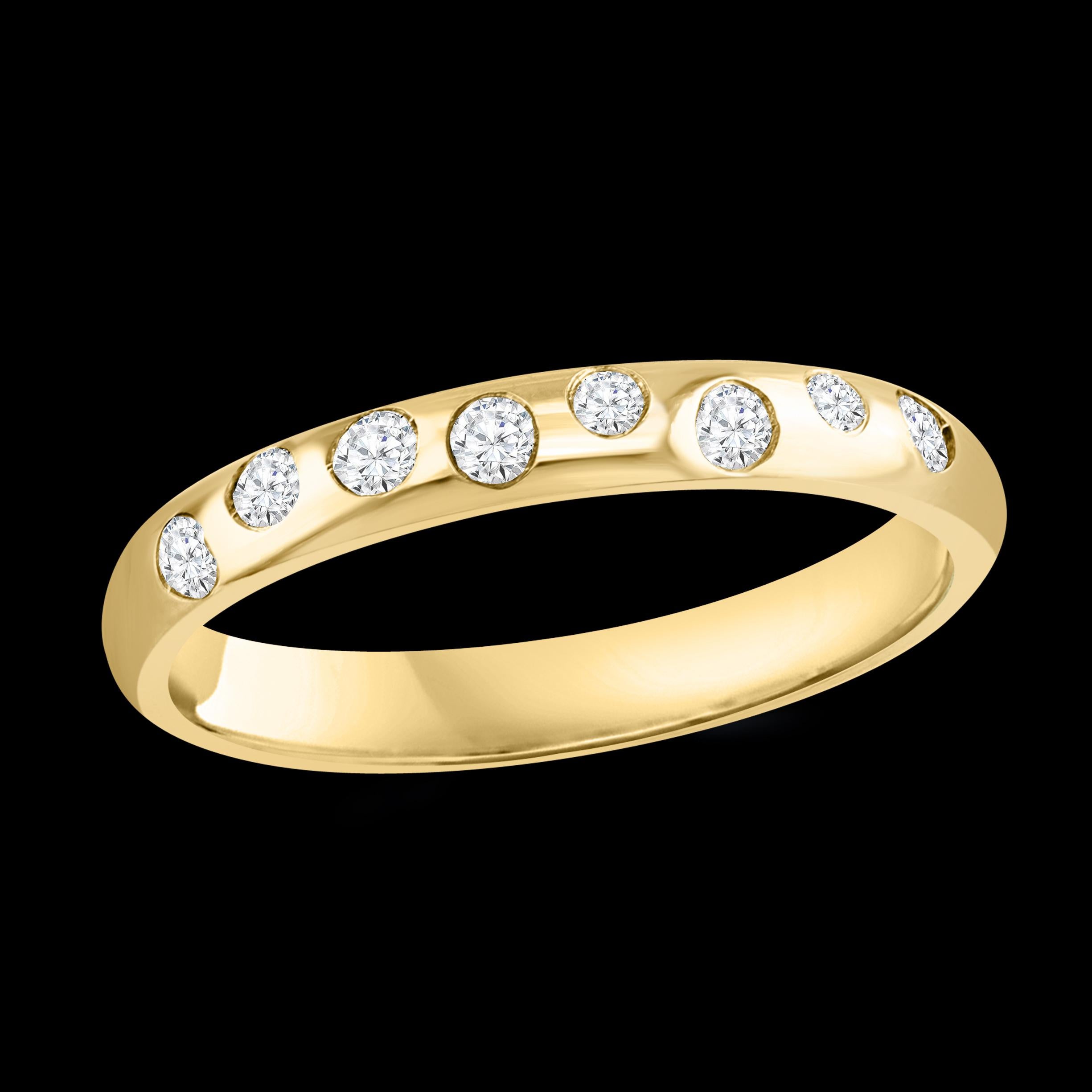 8 Flush Set Bezel Diamond Eternity Wedding Band in 14 Karat Yellow Gold Size 10.25
All 8 diamonds are scattered only in a small portion in the front of the band .
Very clean and shiny diamonds.
This eternity band features Gypsy set or burnished, the