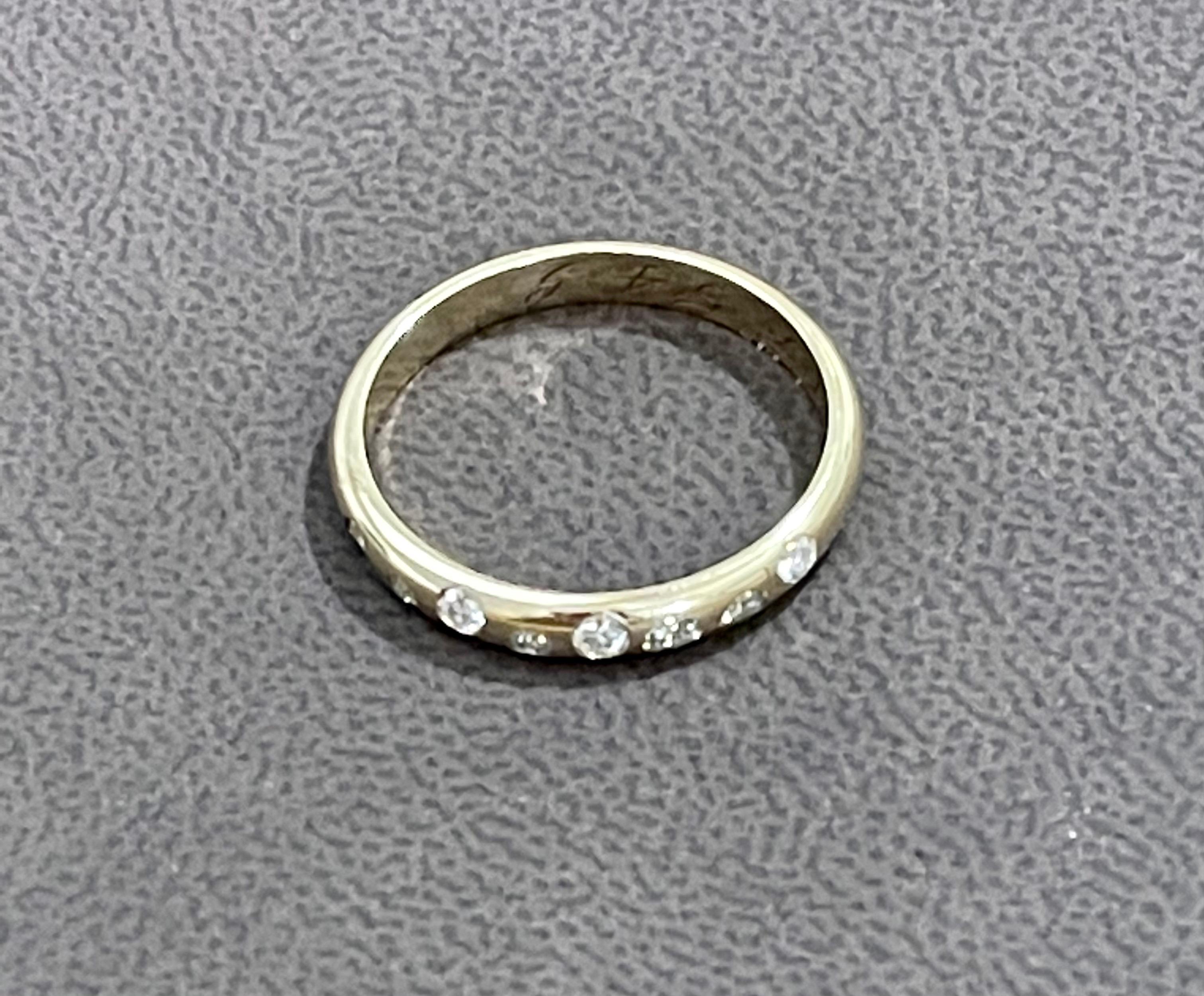 8 Flush Set Bezel Diamond Eternity Wedding Band in 14 Karat Yellow Gold 1