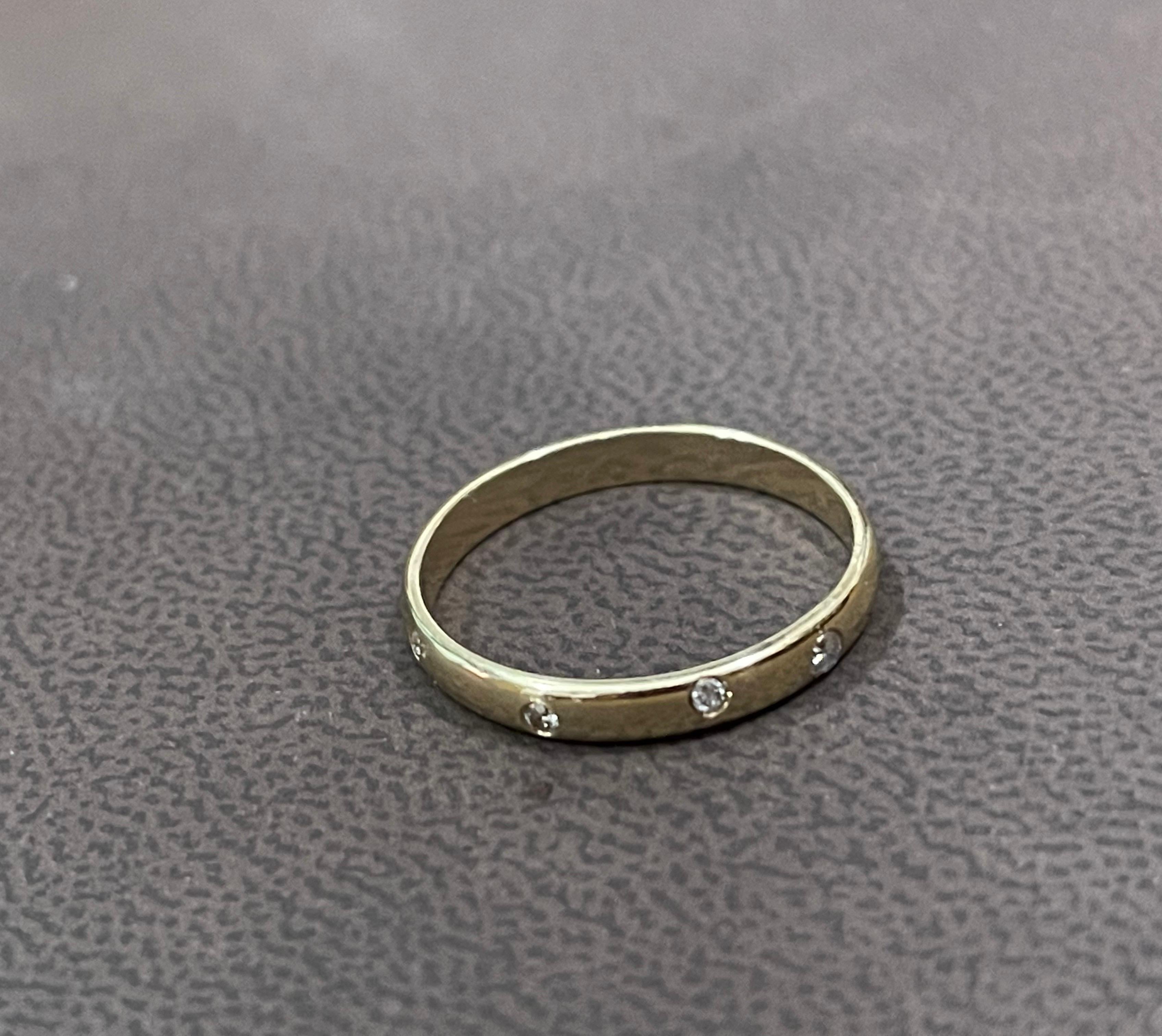 6 Flush Set Bezel Diamond Eternity Wedding Band in 14 Karat Yellow Gold Size 7.5
Very clean and shiny diamonds.
This eternity band features Gypsy set or burnished, the bright white diamonds , 14k gold band ring shines brightly and is a perennial