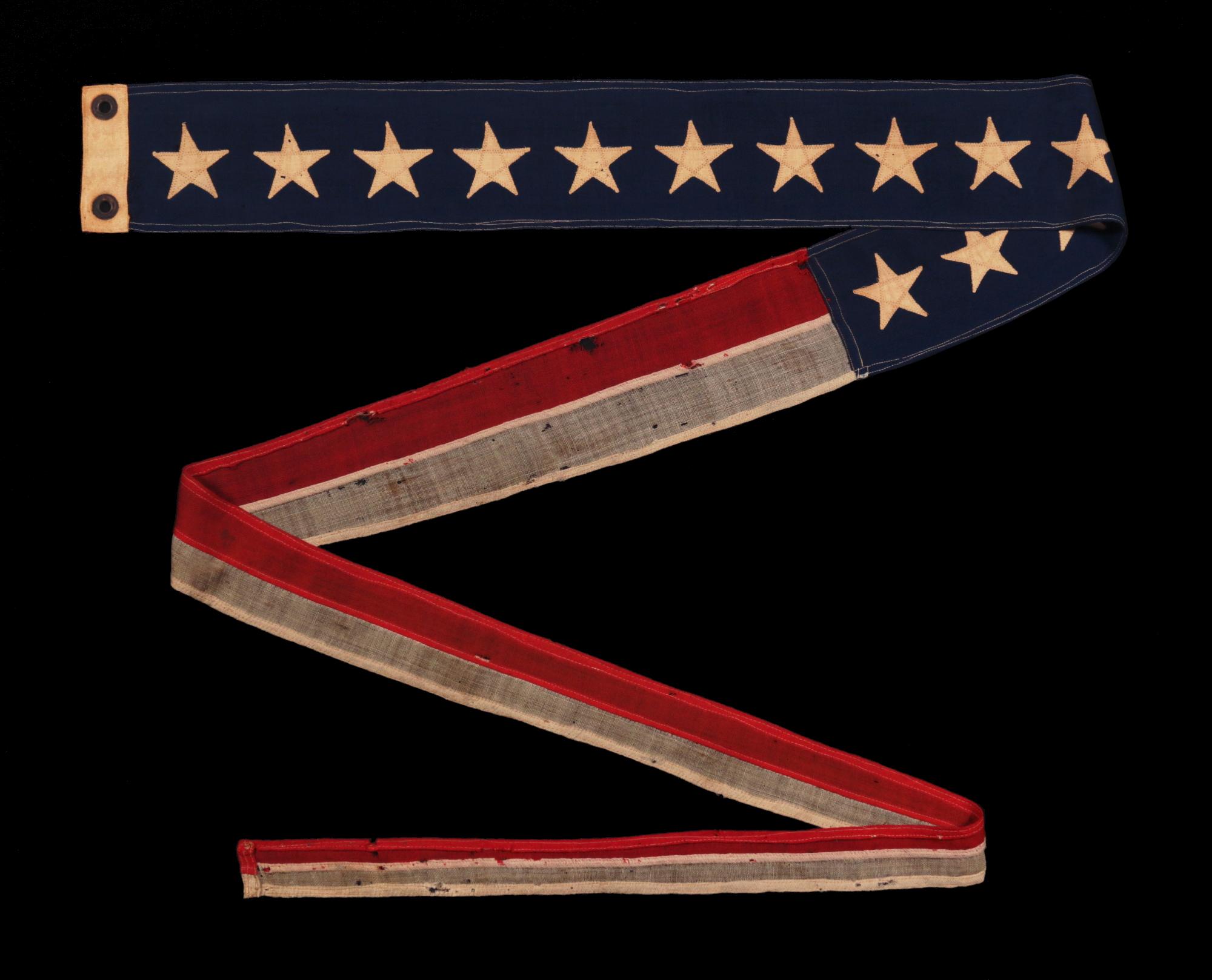 8-Foot commission pennant with 13 stars, a unique example in my experience, likely produced for display on a private vessel, made circa 1892-1910.

Commission pennants are the distinguishing mark of a commissioned U.S. Navy ship. Flown at the