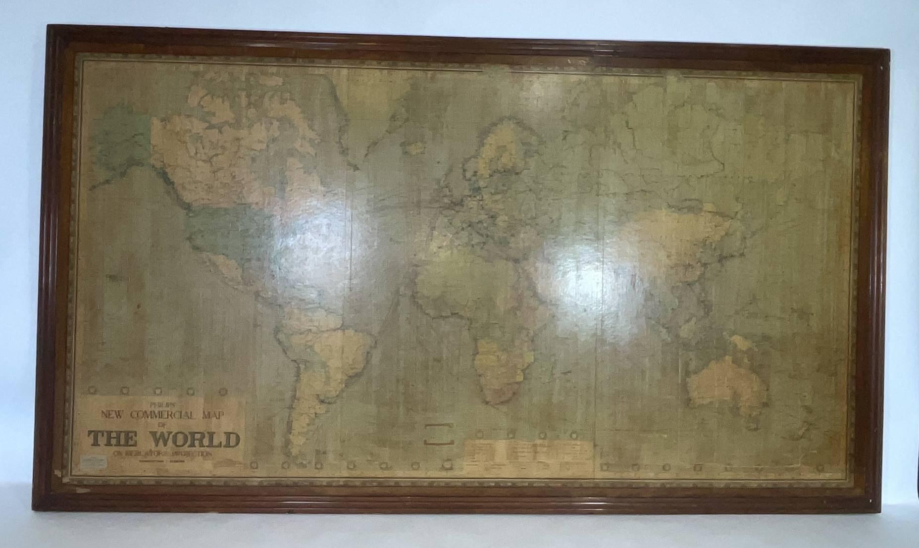 1951 map of the world by George Philip and Son. Large beautiful map as it was in 1951. Nice patina mounted to a sturdy wood frame. Overall good condition. Very large in size. 90