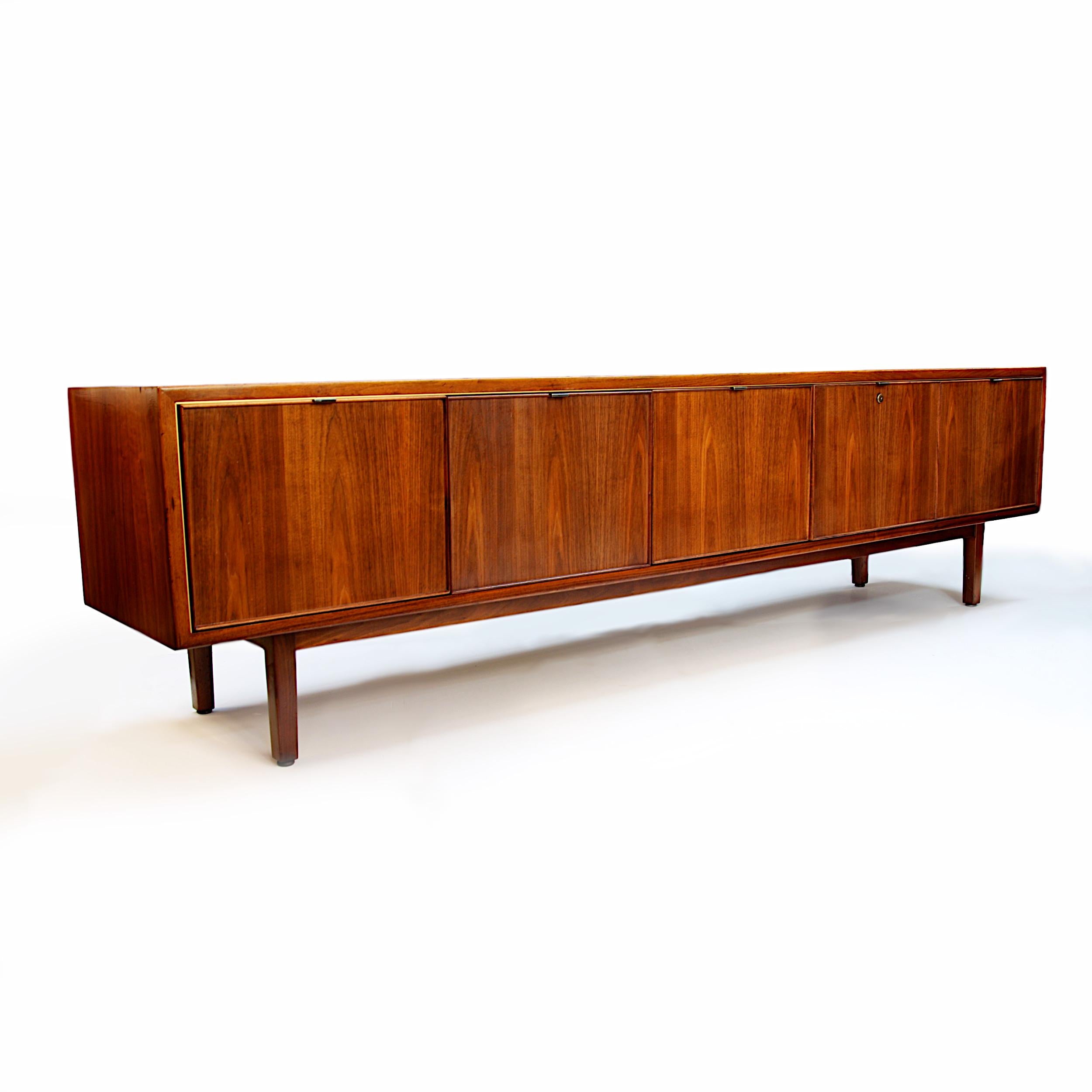 This wonderful Mid-Century Modern credenza by Stow Davis is full of unique features.  Designed by Alexis Yermakov as part of the 
