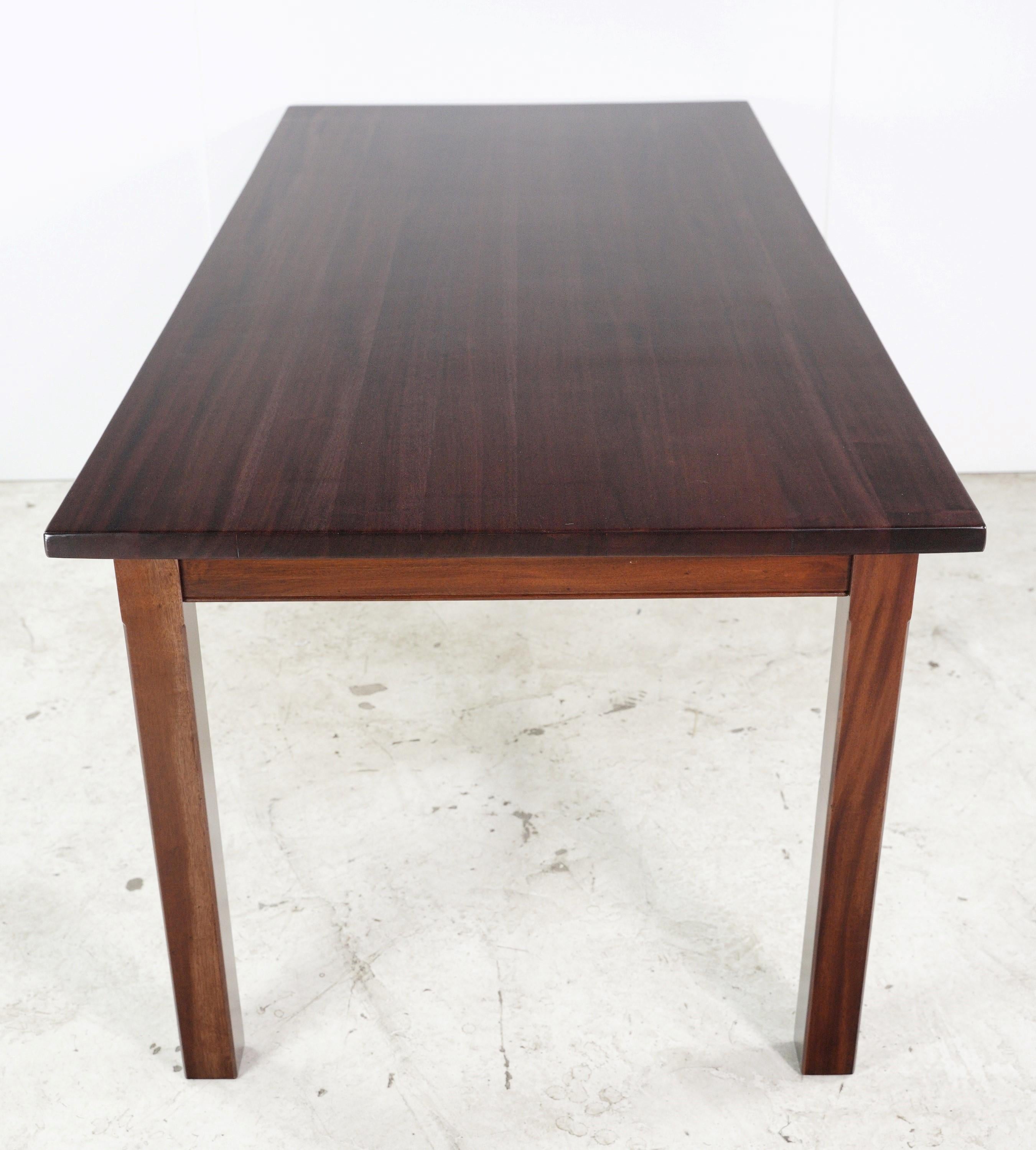 Meticulously made by hand, the reclaimed mahogany square legs dining room table embodies both sustainability and elegance. Its unique blend of rustic charm and modern design creates a captivating focal point for gatherings. This table is ready to