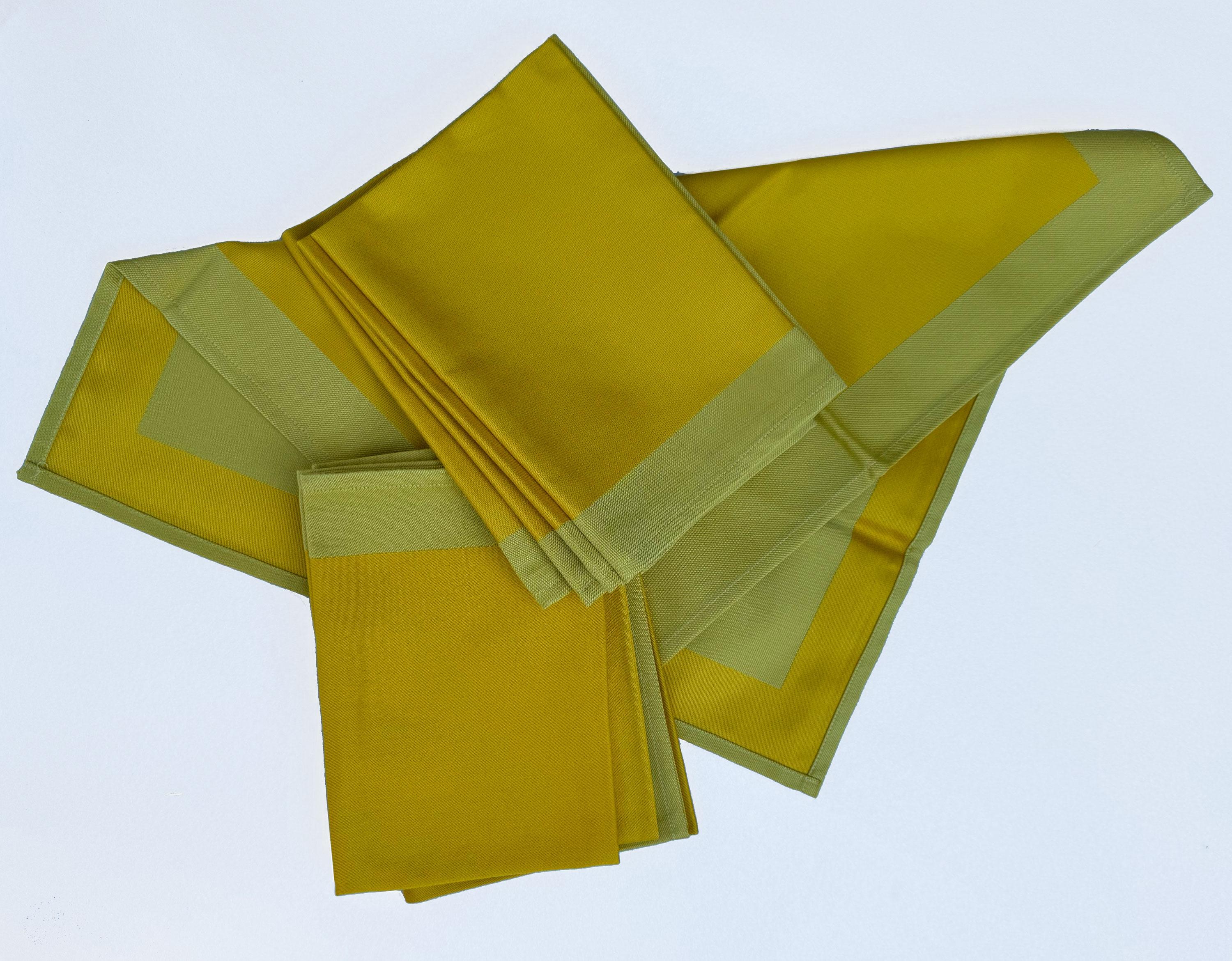 8 Georg Jensen Elegant Yellow and Green Napkins in Original Packaging. Denmark. These summer sunny napkins from Georg Jensen feature a vibrant yellow fabric complemented by a subtle green border. Known for their high-quality craftsmanship, these