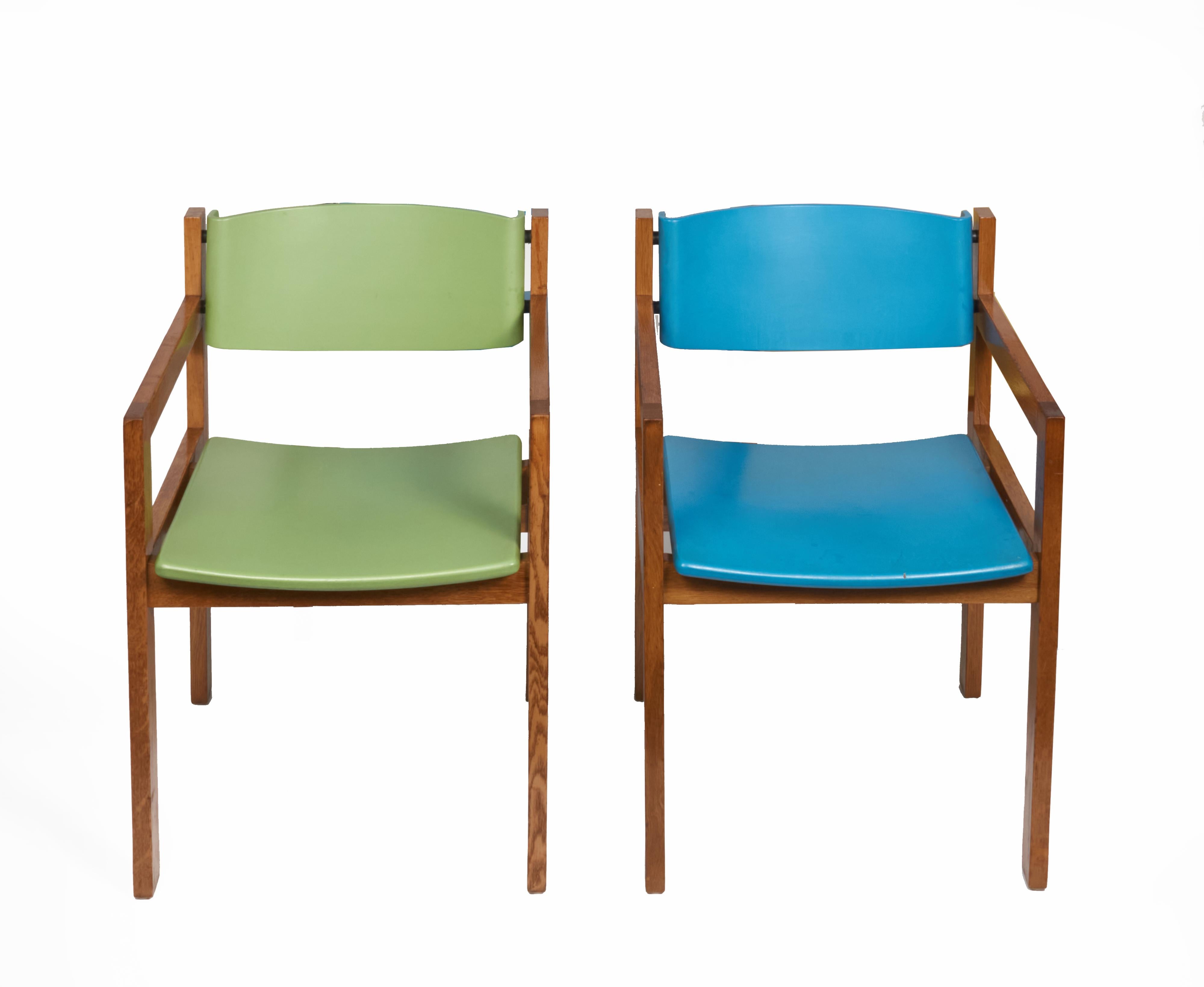 Great set of brightly colored armchairs by designer Harvey Probber in green, blue and yellow. Add a fun punch to any room with these comfortable and sturdy chairs. The set contains 3 green, 3 yellow and 2 blue chairs with painted backs and sets.