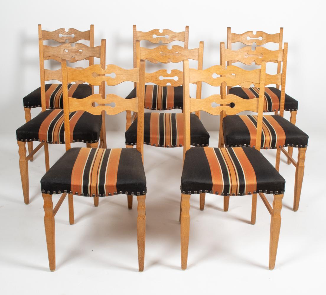 This impressive mid-century dining set of eight is representative of the fundamental axioms of Scandinavian design that revolve around quality and functionality and pairs it with a distinctive design. Kjaernulf’s works reveal quality craftsmanship