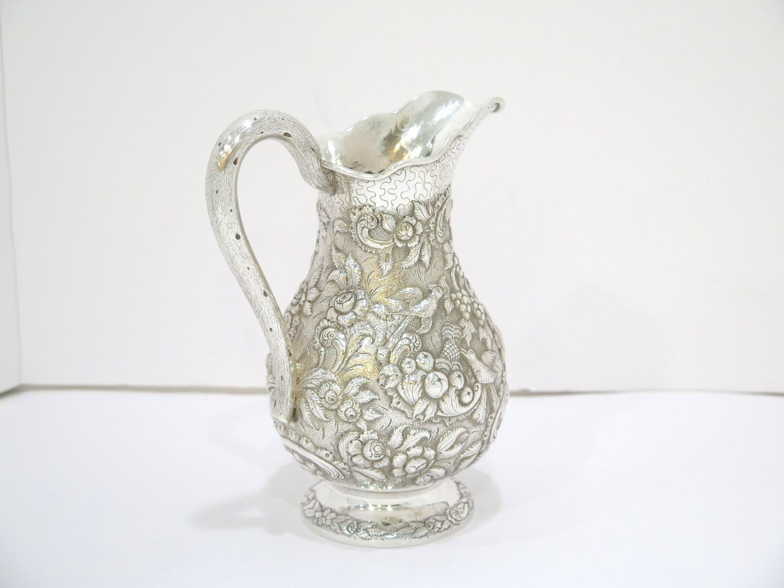 Coin Silver A. E. Warner Antique Birds Flowers Repousse Small Pitcher In Good Condition For Sale In Brooklyn, NY