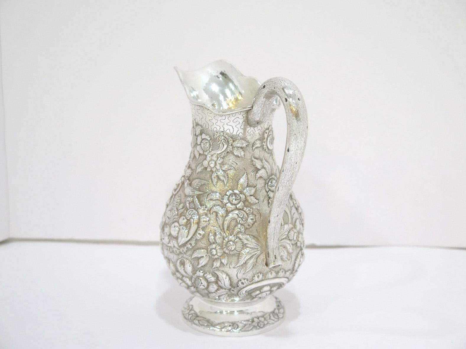 19th Century Coin Silver A. E. Warner Antique Birds Flowers Repousse Small Pitcher For Sale