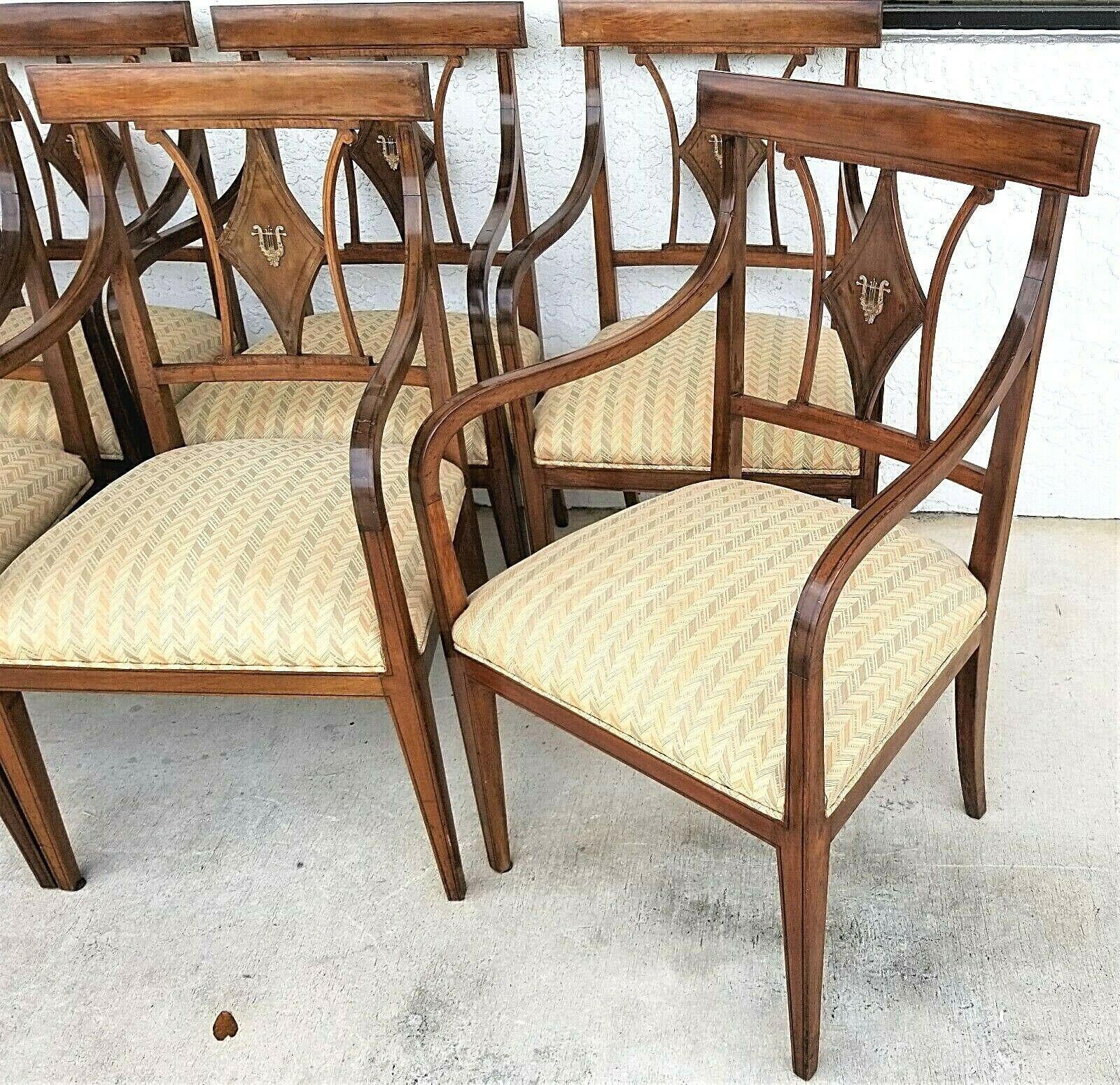 For full item description be sure to click on CONTINUE READING at the bottom of this listing.

Offering one of our recent palm beach estate fine furniture acquisitions of a
set of 8 antique regency style mahogany dining armchairs with Lyre