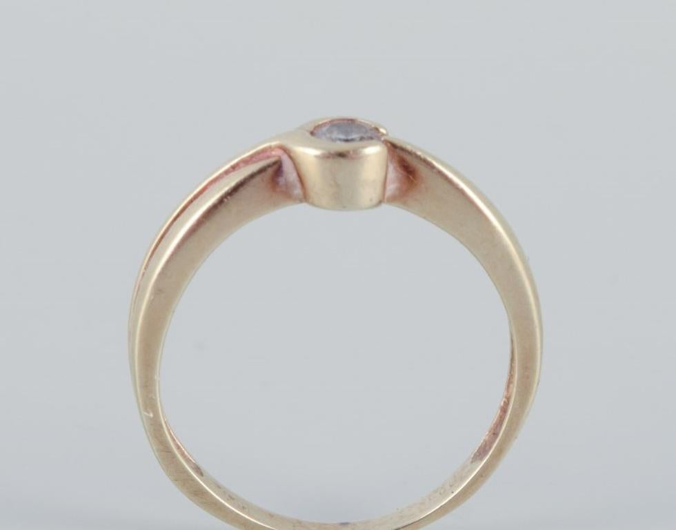 Brilliant Cut 8-karat gold ring with a small diamond. Modernist design. Mid-20th C. For Sale