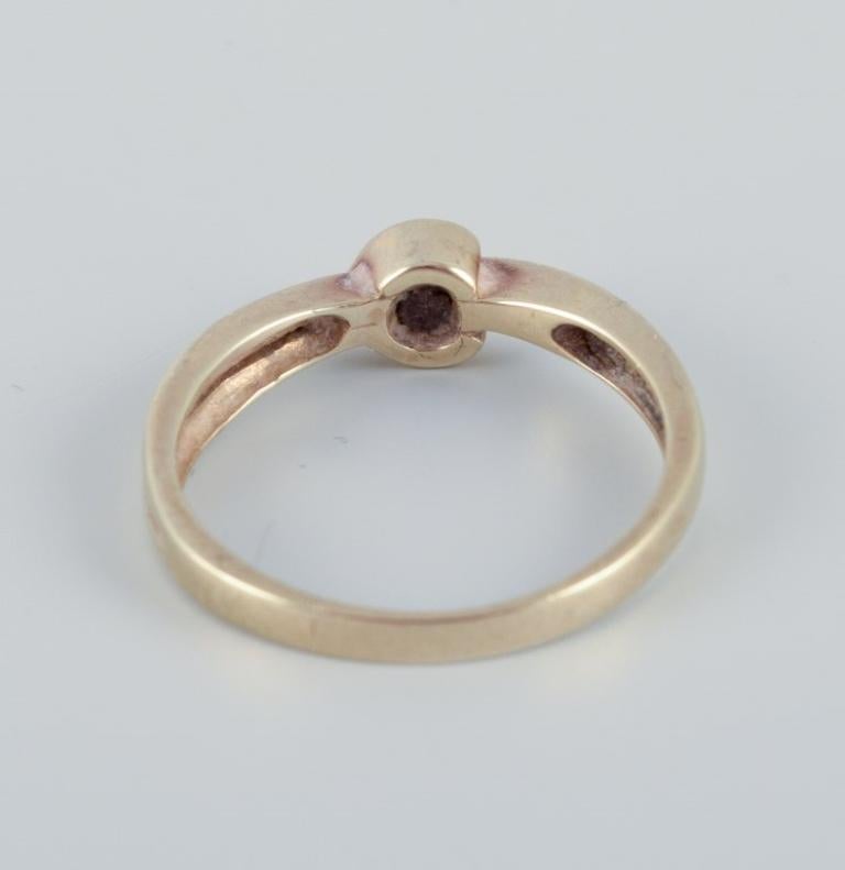 Women's 8-karat gold ring with a small diamond. Modernist design. Mid-20th C. For Sale