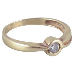 8-karat gold ring with a small diamond. Modernist design. Mid-20th C.