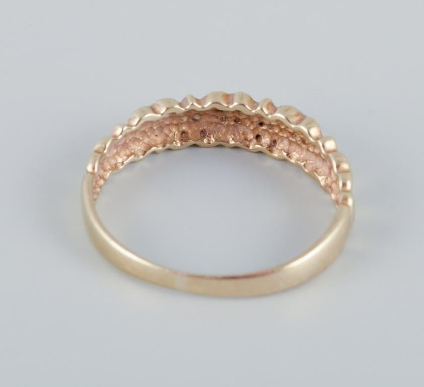 Modern 8-karat gold ring with numerous small diamonds in modernist design. For Sale