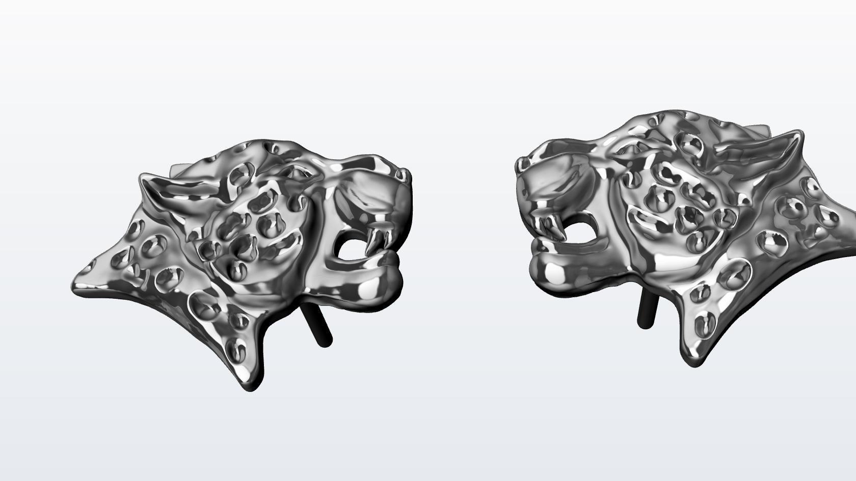18 Karat White Gold Leopard stud earrings, Tiffany designer Thomas Kurilla went back to the archives in the collection of metal stampings  The leopard, one of the fastest land animals. Beautiful spots ,elegant in its movement.  I can't let good
