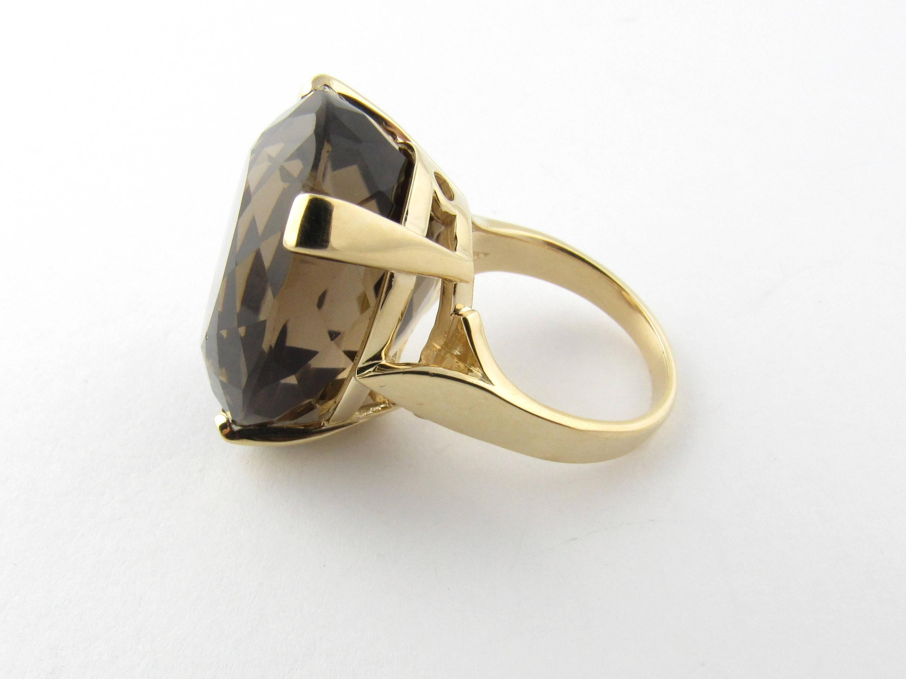 Vintage 8 Karat Yellow Gold Smoky Topaz Ring Size 6- 
This statement ring features a stunning oval smoky topaz (24 mm x 19 mm) set in a lovely 8K yellow gold setting. Height: 14 mm. Shank: 2 mm. 
Ring Size: 6 
Weight: 9.9 dwt. /  15.4 gr. 
Hallmark: