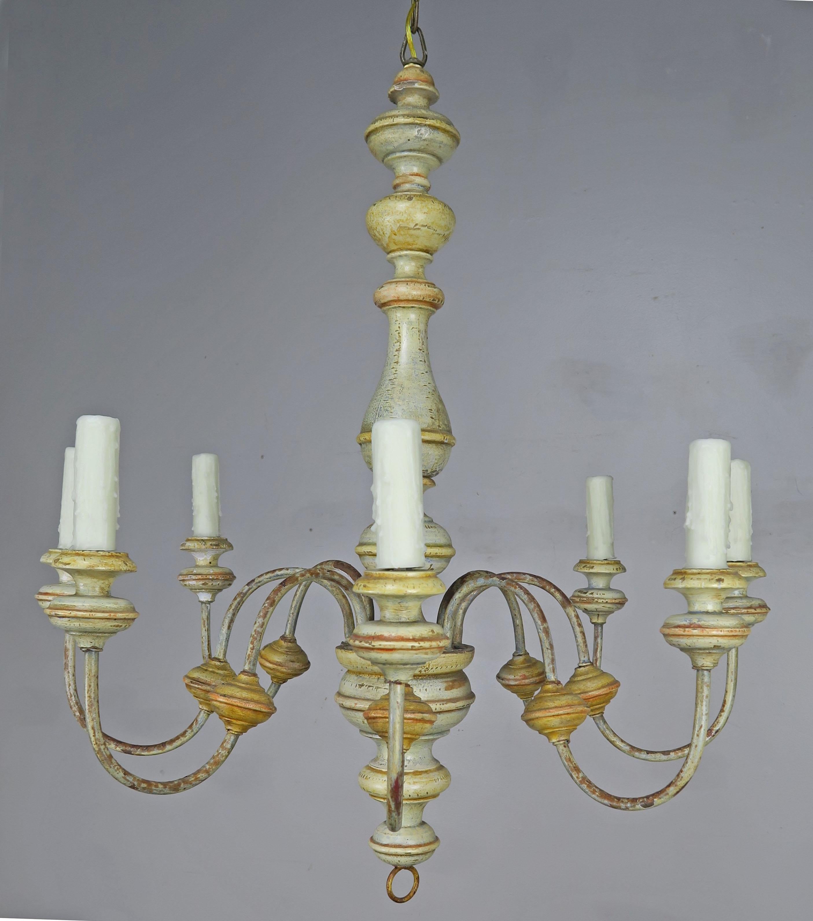 (8) light Italian chandelier painted in soft hues of celadon and gold. The fixture is newly rewired with cream drip wax candle covers. Includes chain and canopy.