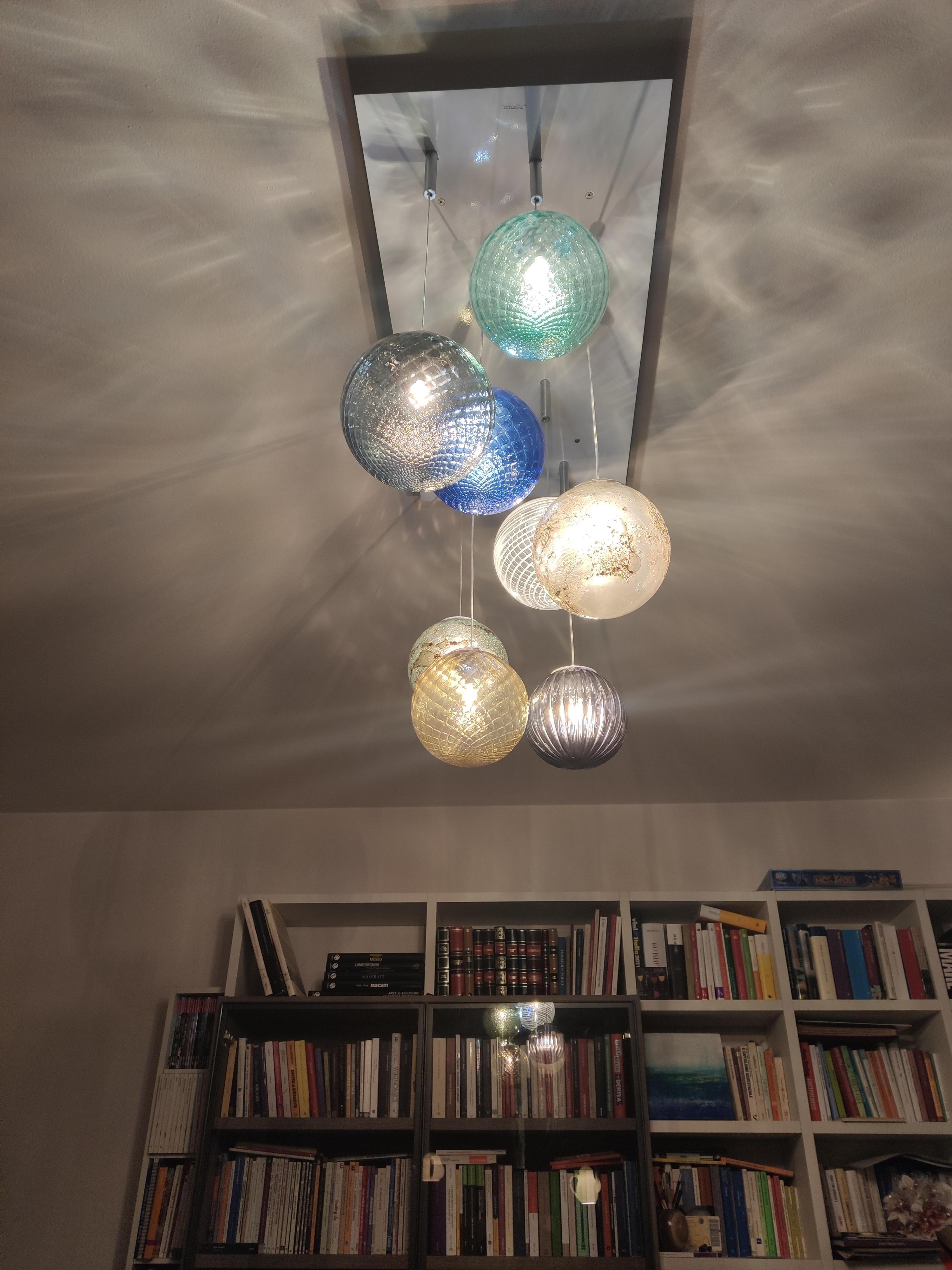 Italian 8 lights ceiling chandelier with colored transparent Murano glass spheres For Sale