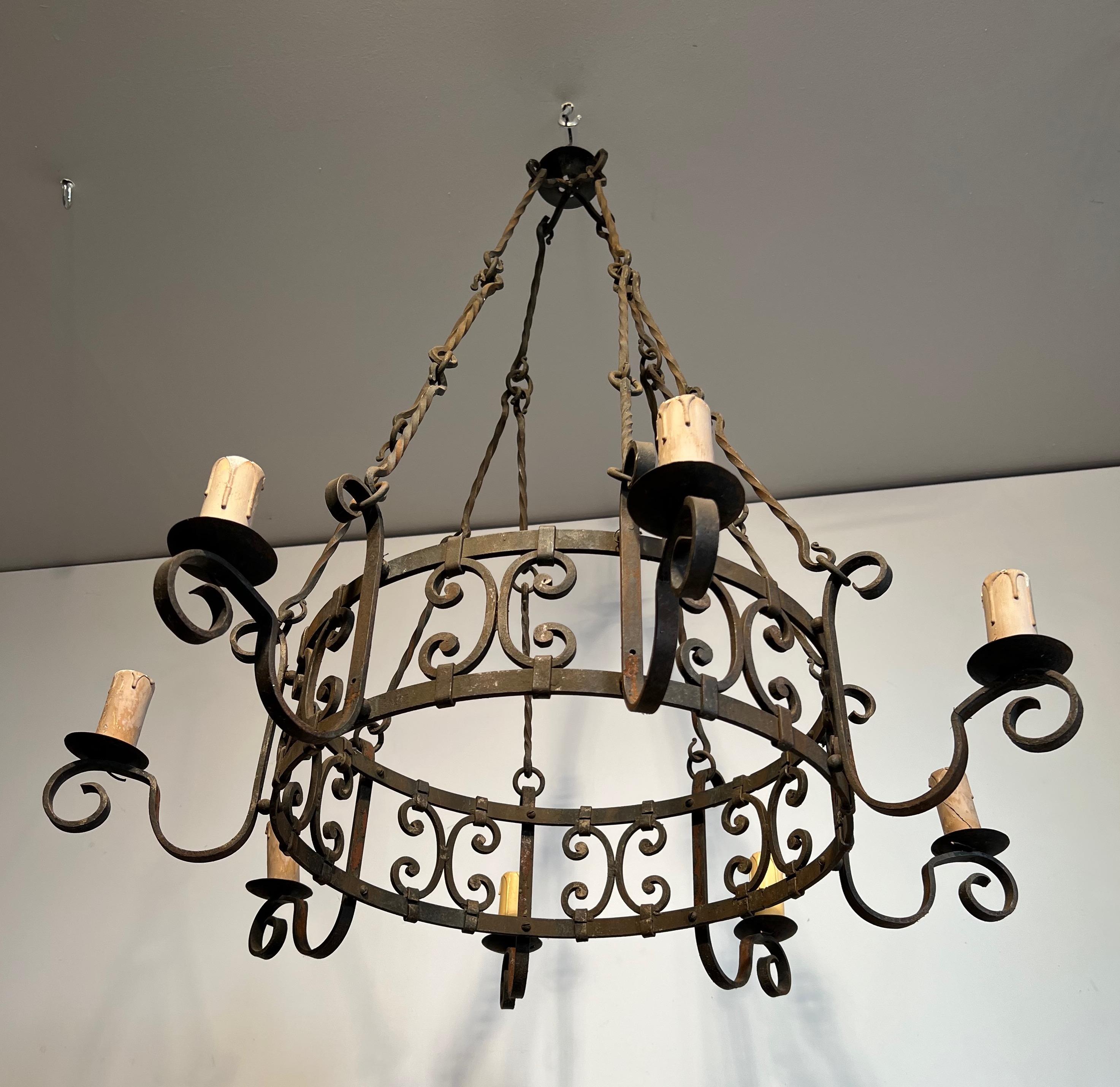8 lights wrought iron chandelier. French work in the Gothic style. Circa 1950 6