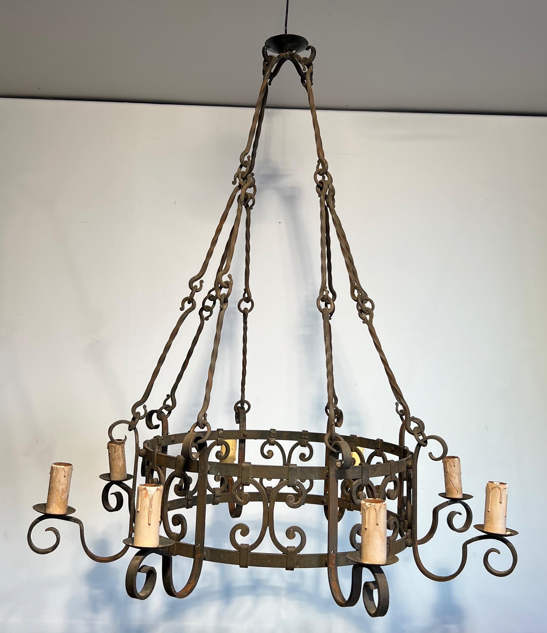 8 lights wrought iron chandelier. French work in the Gothic style. Circa 1950 12