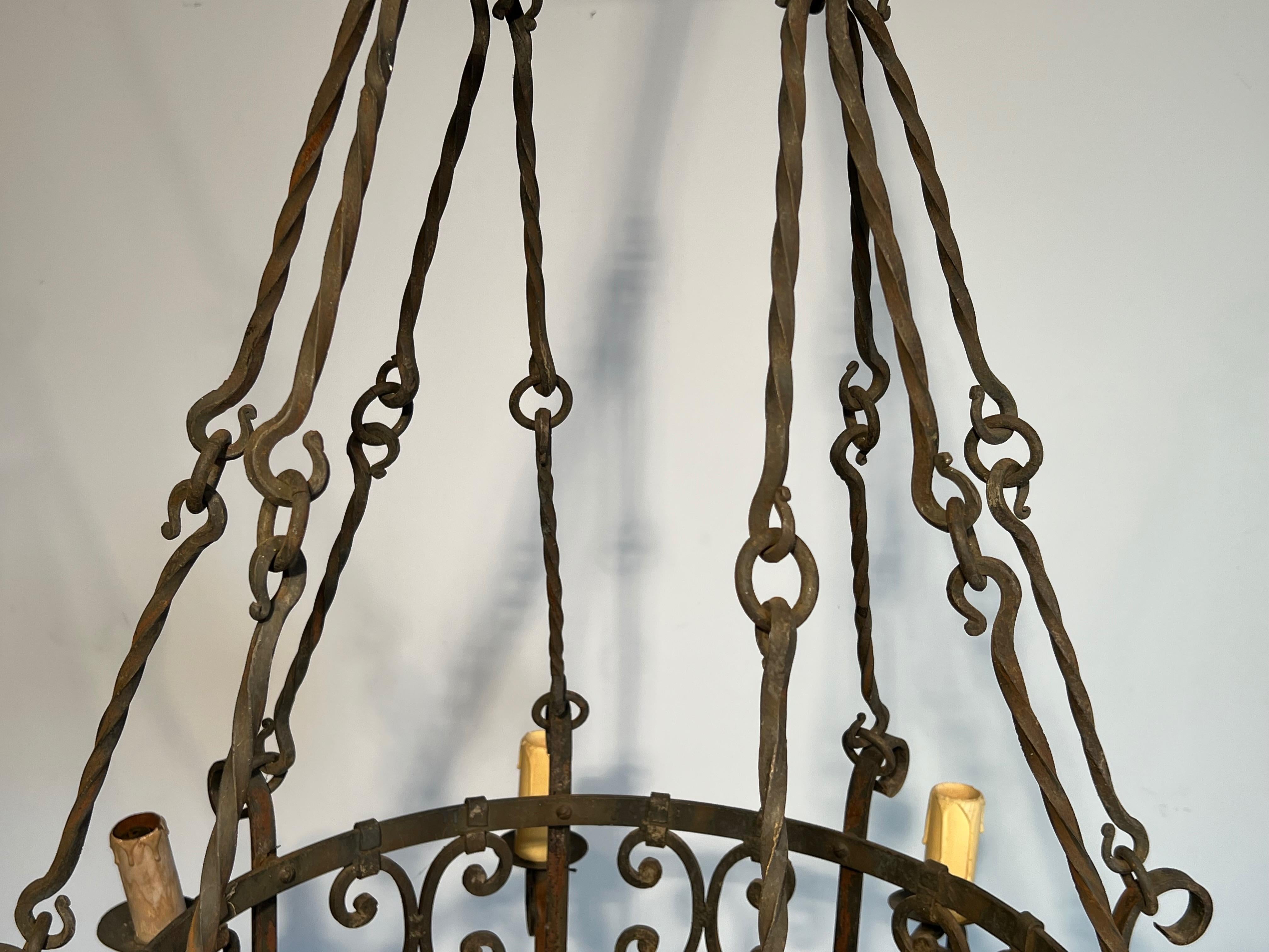 8 lights wrought iron chandelier. French work in the Gothic style. Circa 1950 1