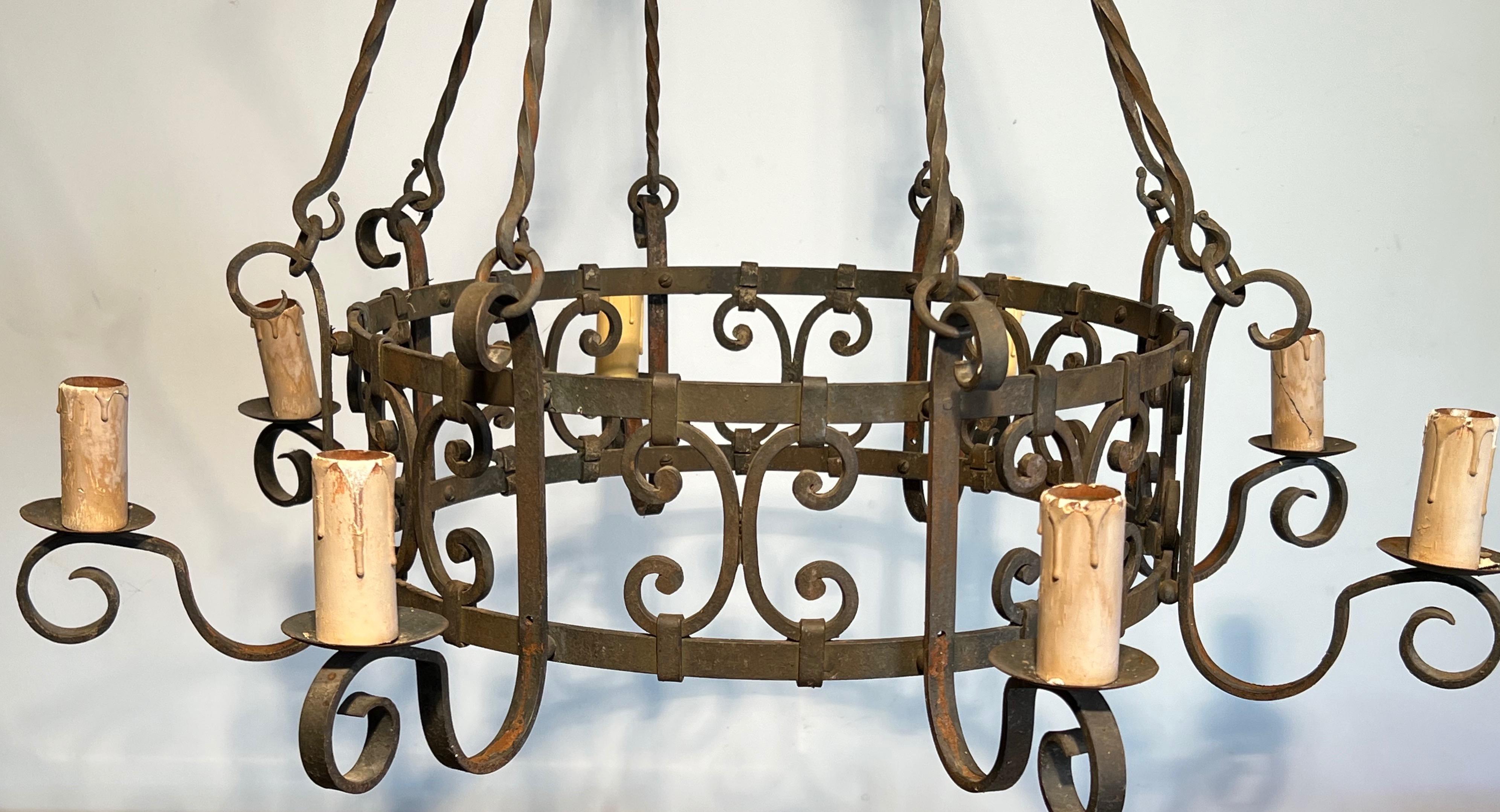 8 lights wrought iron chandelier. French work in the Gothic style. Circa 1950 3