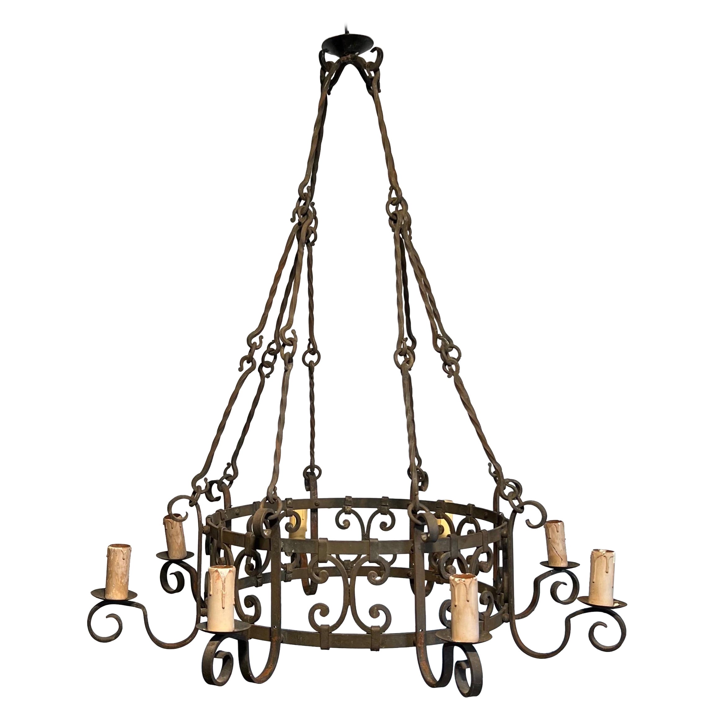8 lights wrought iron chandelier. French work in the Gothic style. Circa 1950