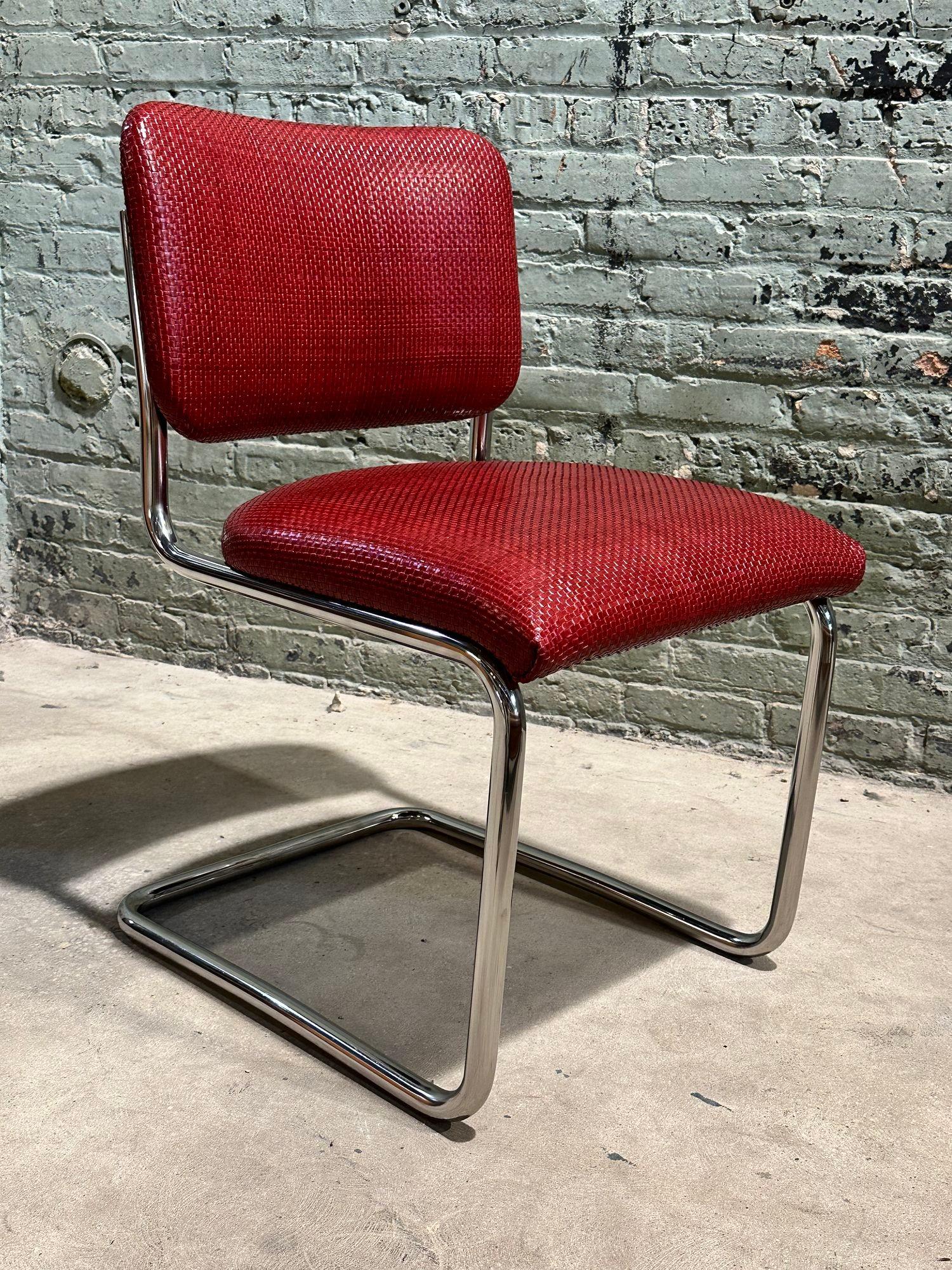 8 Marcel Breuer Cesca Side/Dining Chairs for Knoll, 1980. Woven leather upholstered in the style of Bottega Veneta.
Measure 31