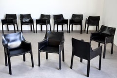 8 Poltrone Mario Bellini CAB 413 in pelle nera per Cassina, anni '80 Italia