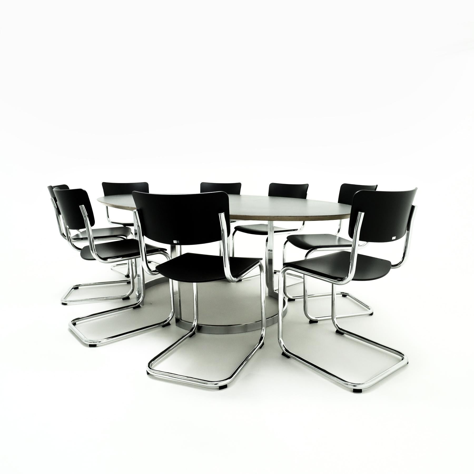 Bauhaus 8 Mart Stam Thonet S43 chairs matched to a large Milo Baughman style table  