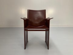8 Matteo Grassi “Korium” Dining Chairs, in Brown Coach Leather