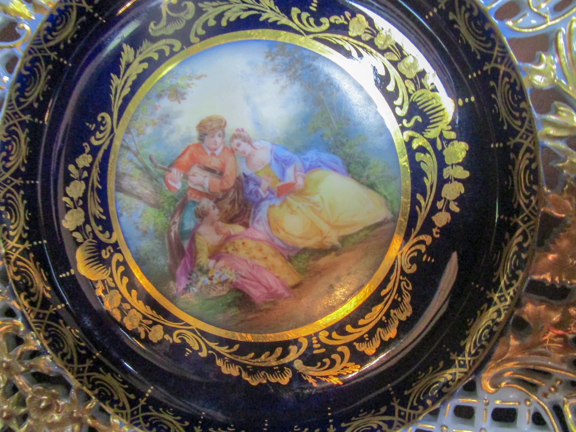 8 Meissen Germany 19thc Cobalt Reticulated Porcelain Plates with Courting Scenes In Good Condition For Sale In Savannah, GA